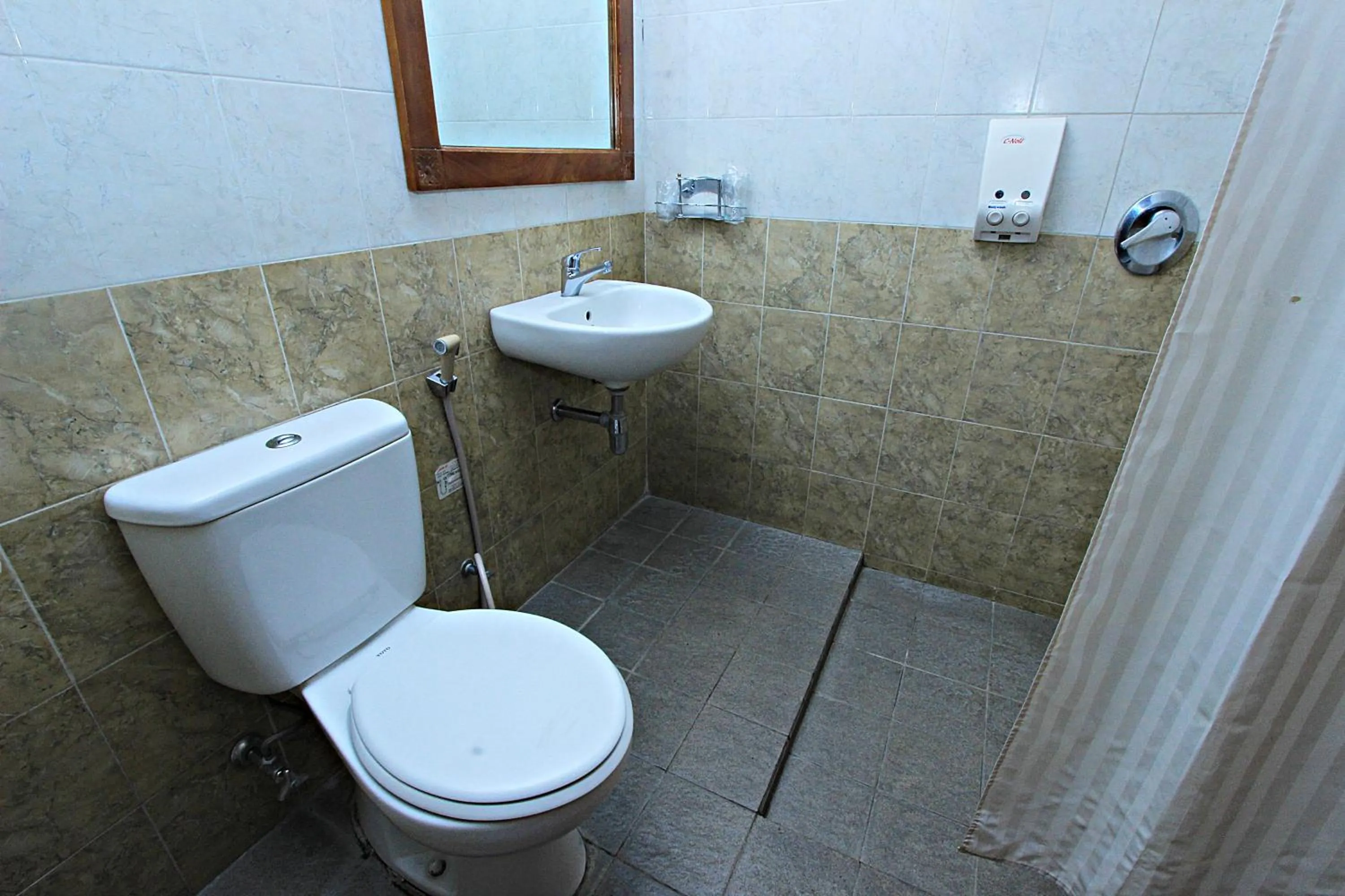 Bathroom in Griya Sentana Hotel