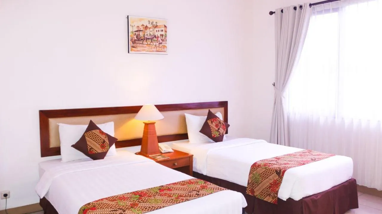 Bed in Griya Sentana Hotel