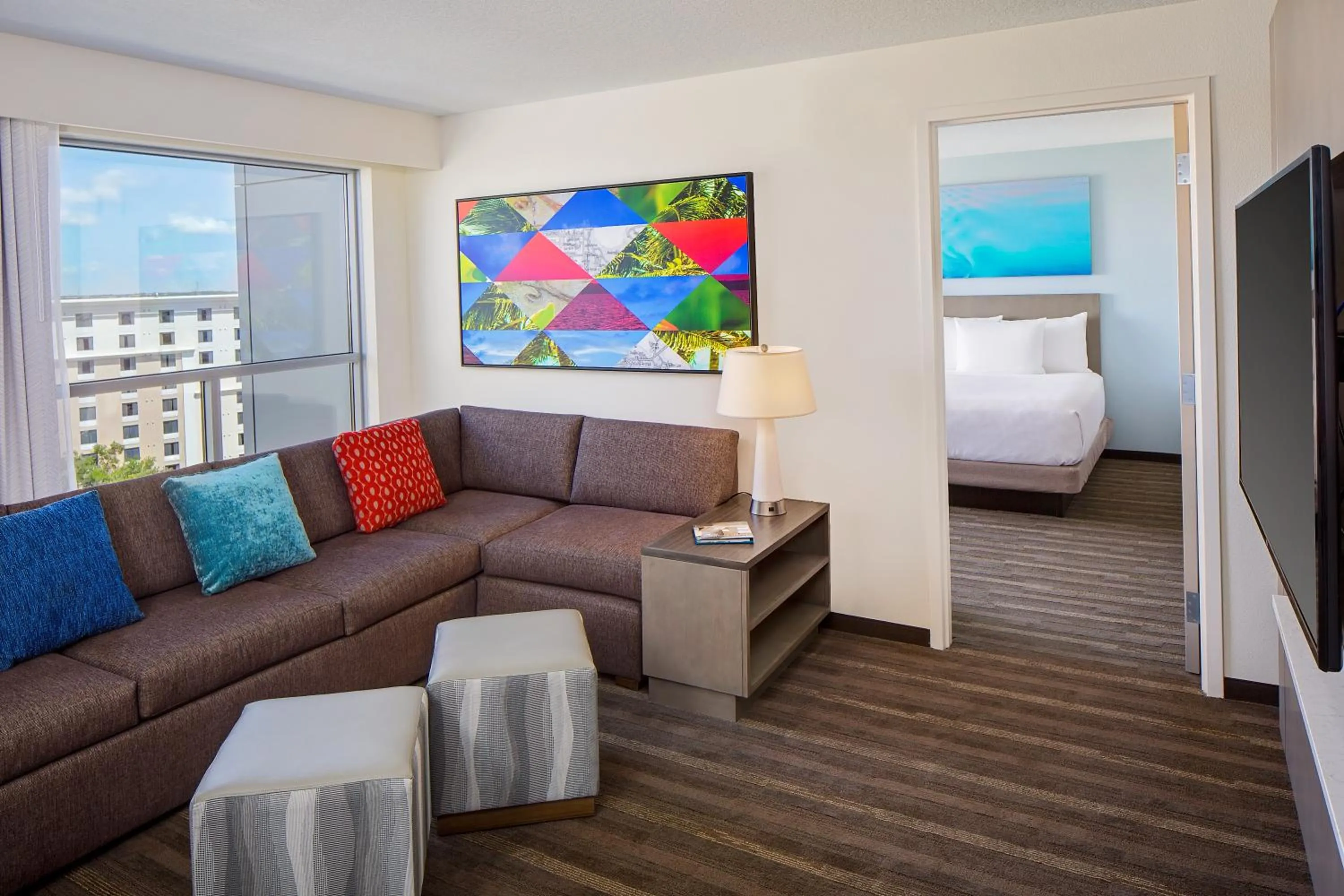 Living room, Bed in Hyatt House across from Universal Orlando Resort