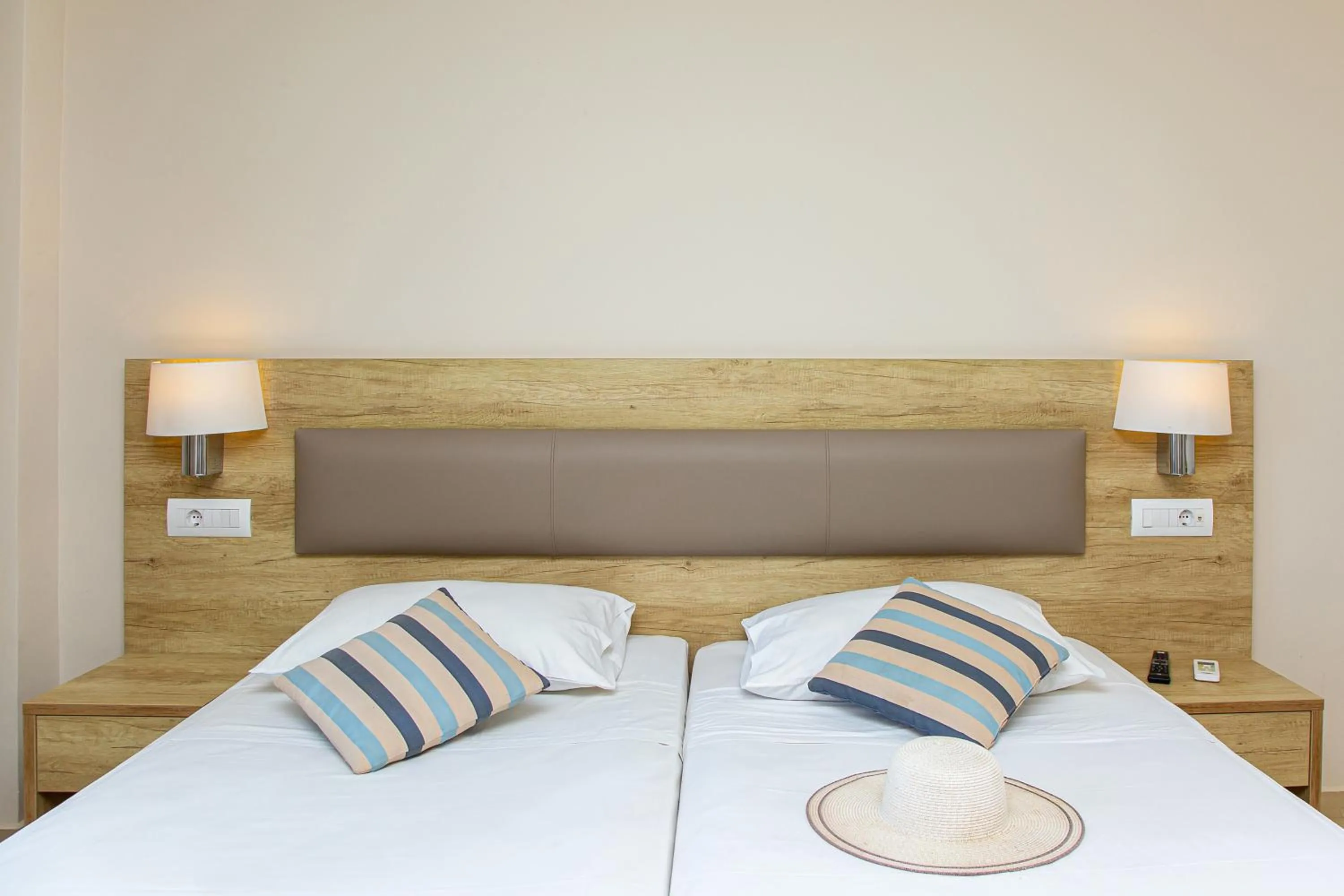 Bed in Theo Star Beach Hotel