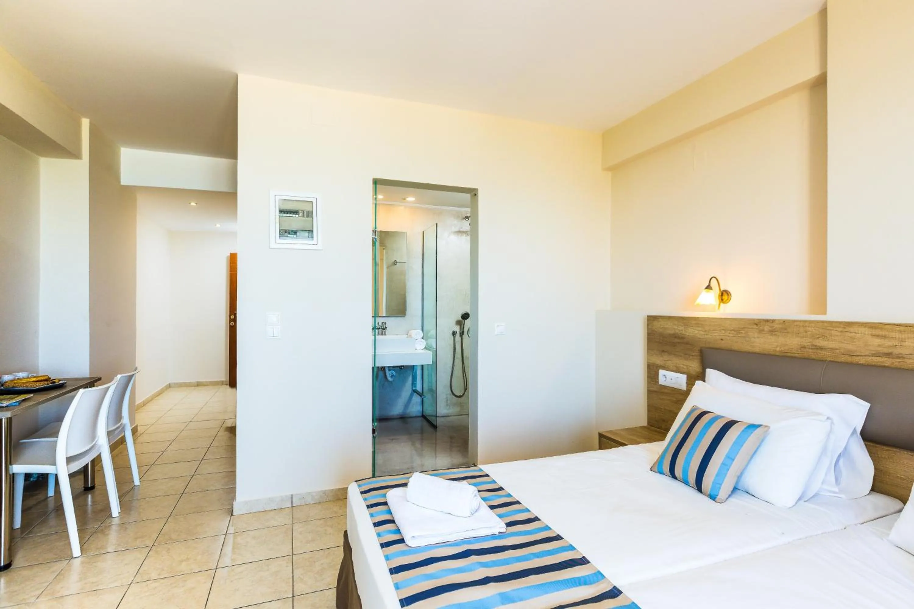 Bed in Theo Star Beach Hotel