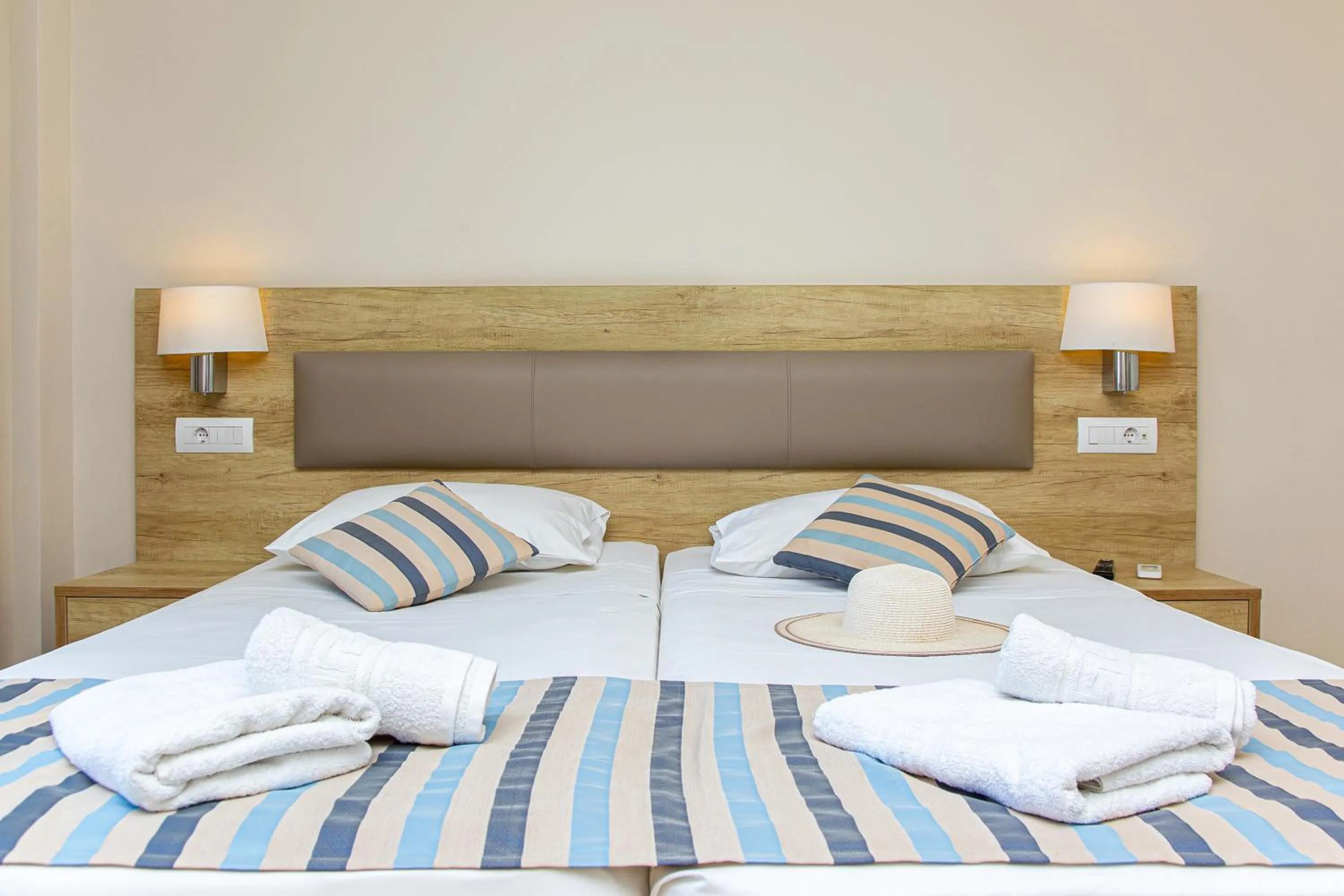 Bed in Theo Star Beach Hotel