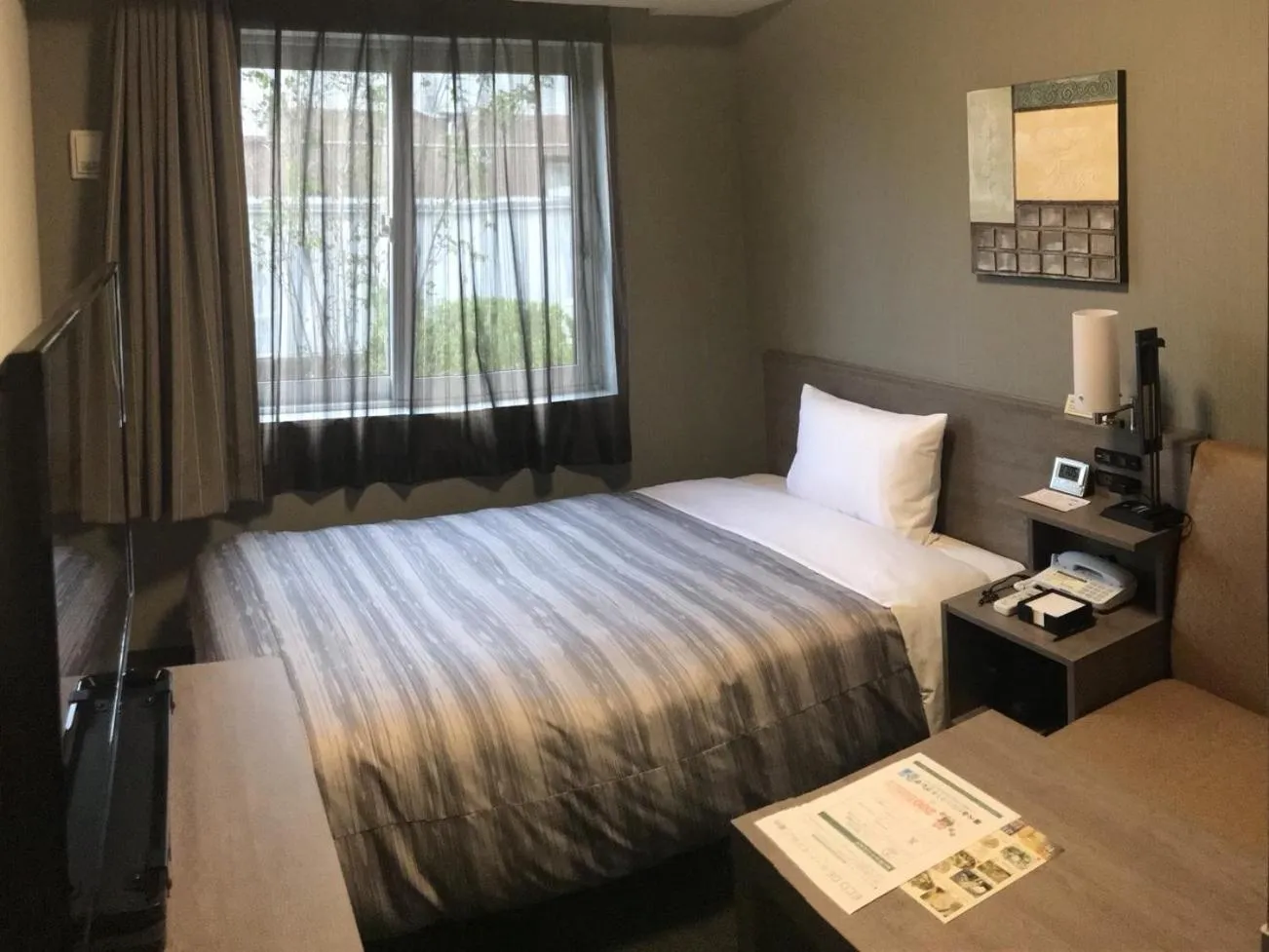 Photo of the whole room, Bed in Hotel Route-Inn Nakano