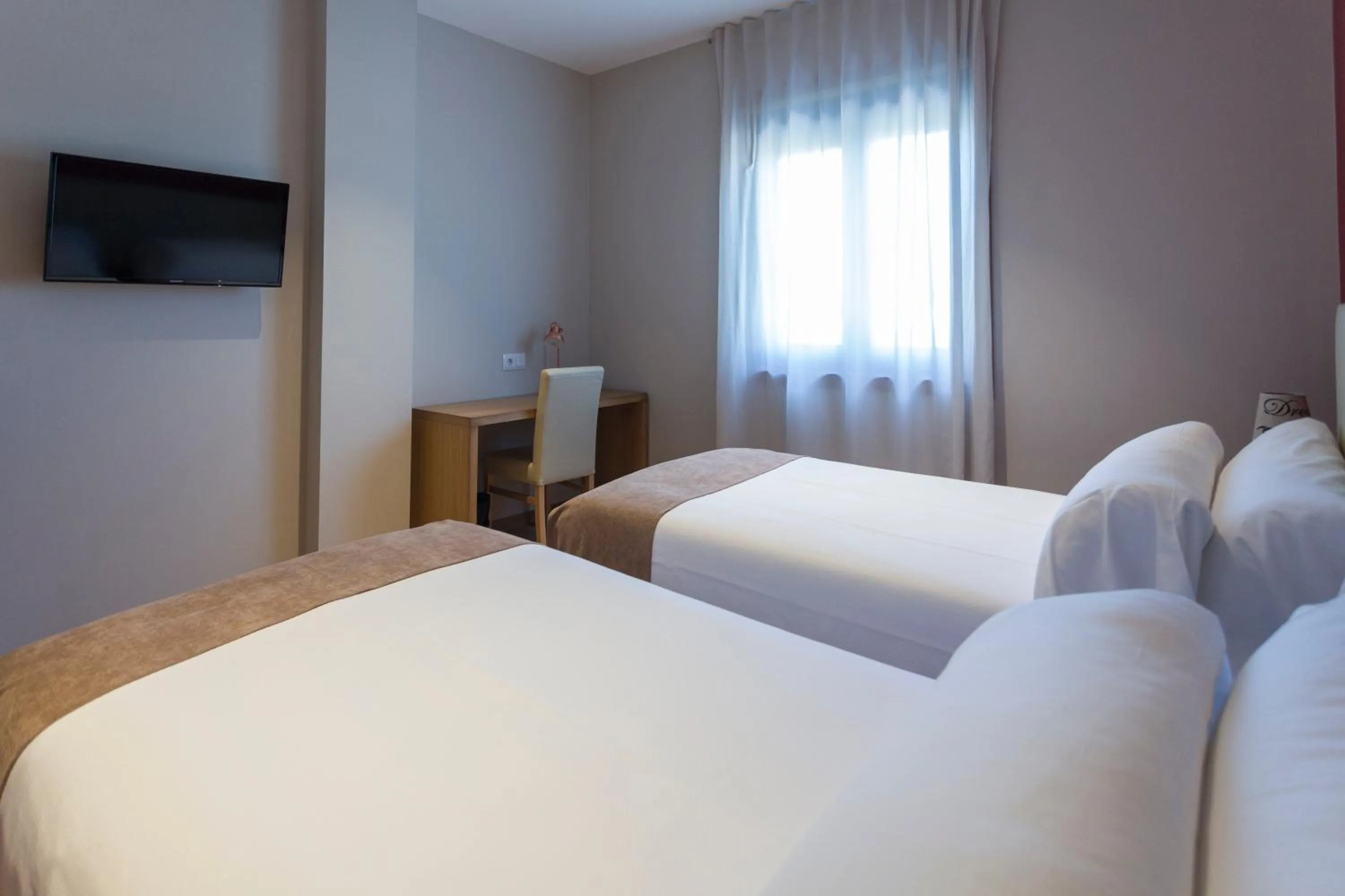 Communal lounge/ TV room in Hotel A Roldana