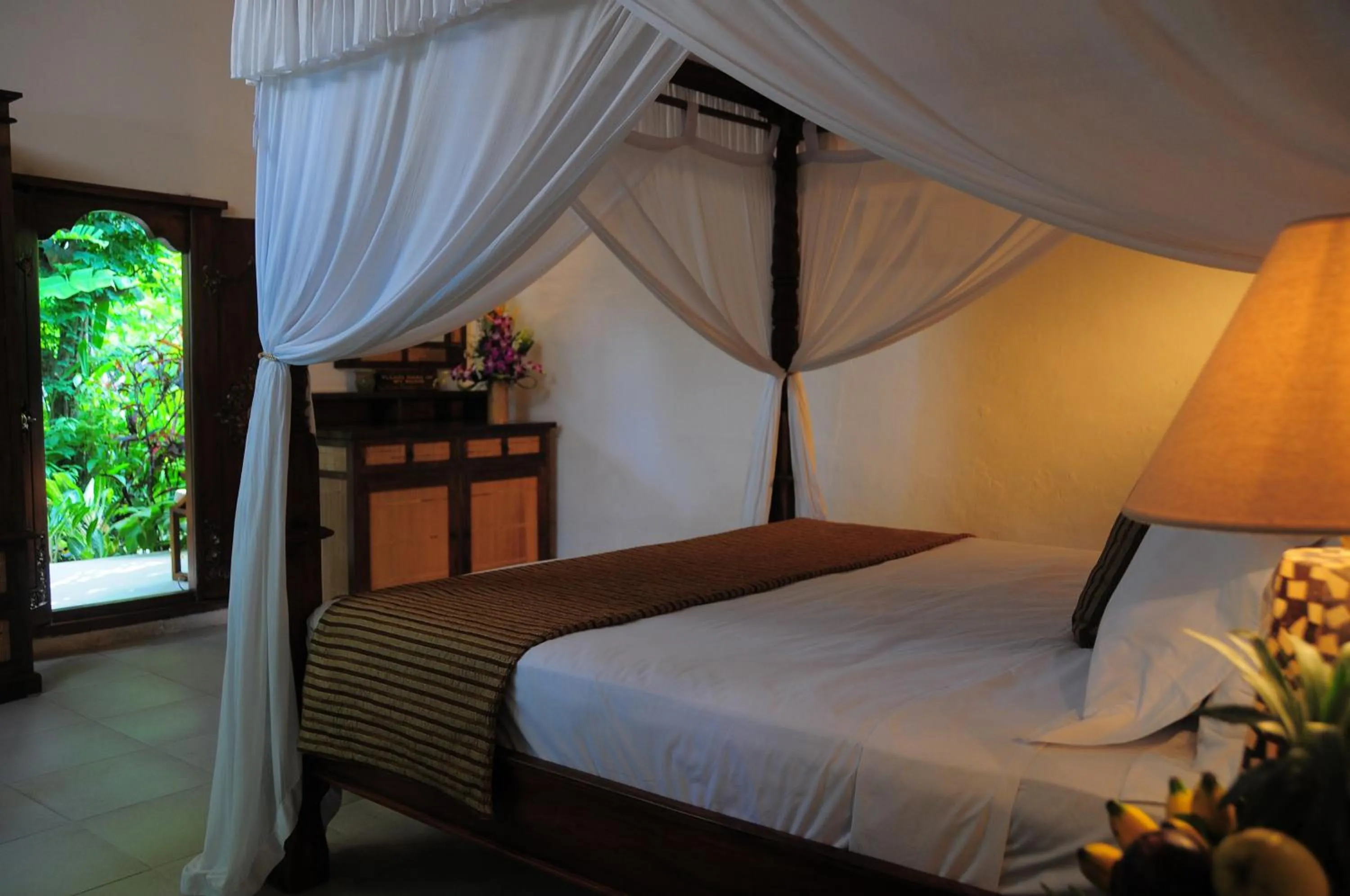 Bed in Tirta Ayu Hotel and Restaurant