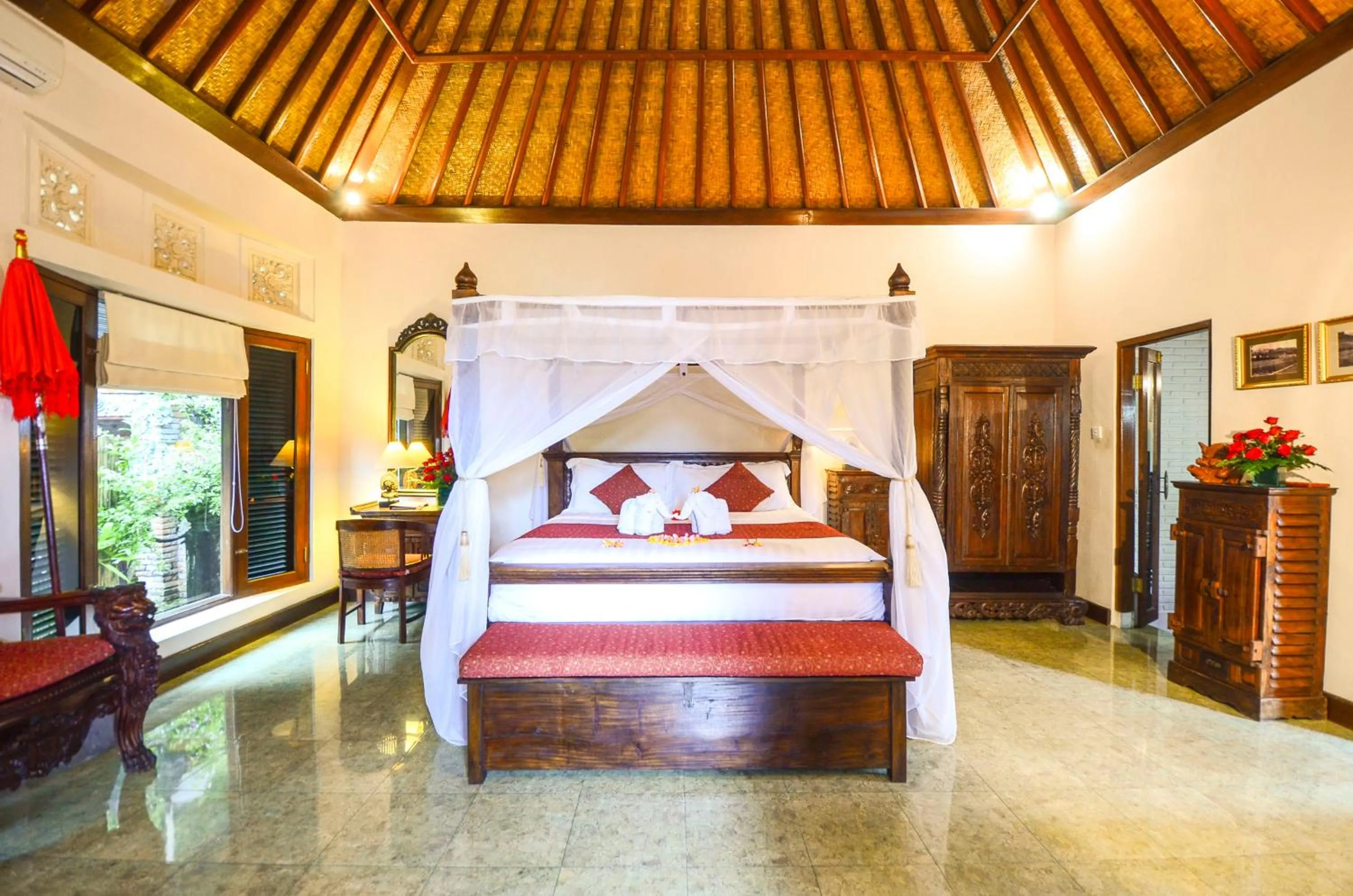 Photo of the whole room, Bed in Tirta Ayu Hotel and Restaurant