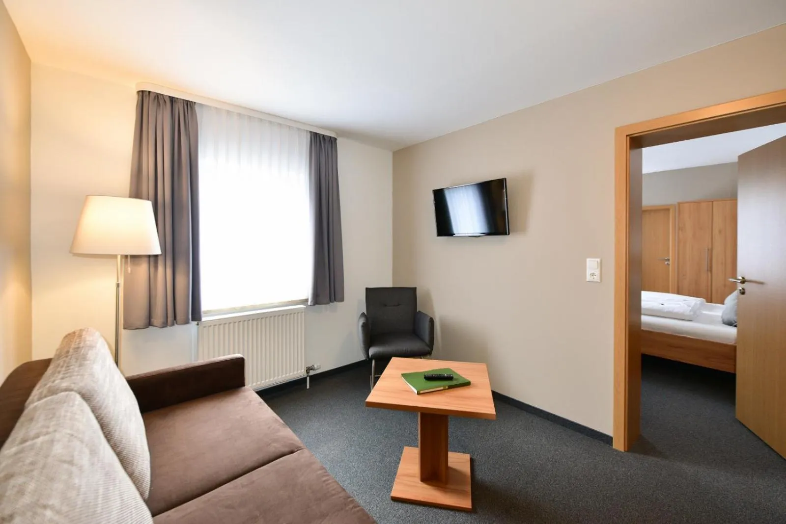 Seating area, Bed in Gasthof Kolb