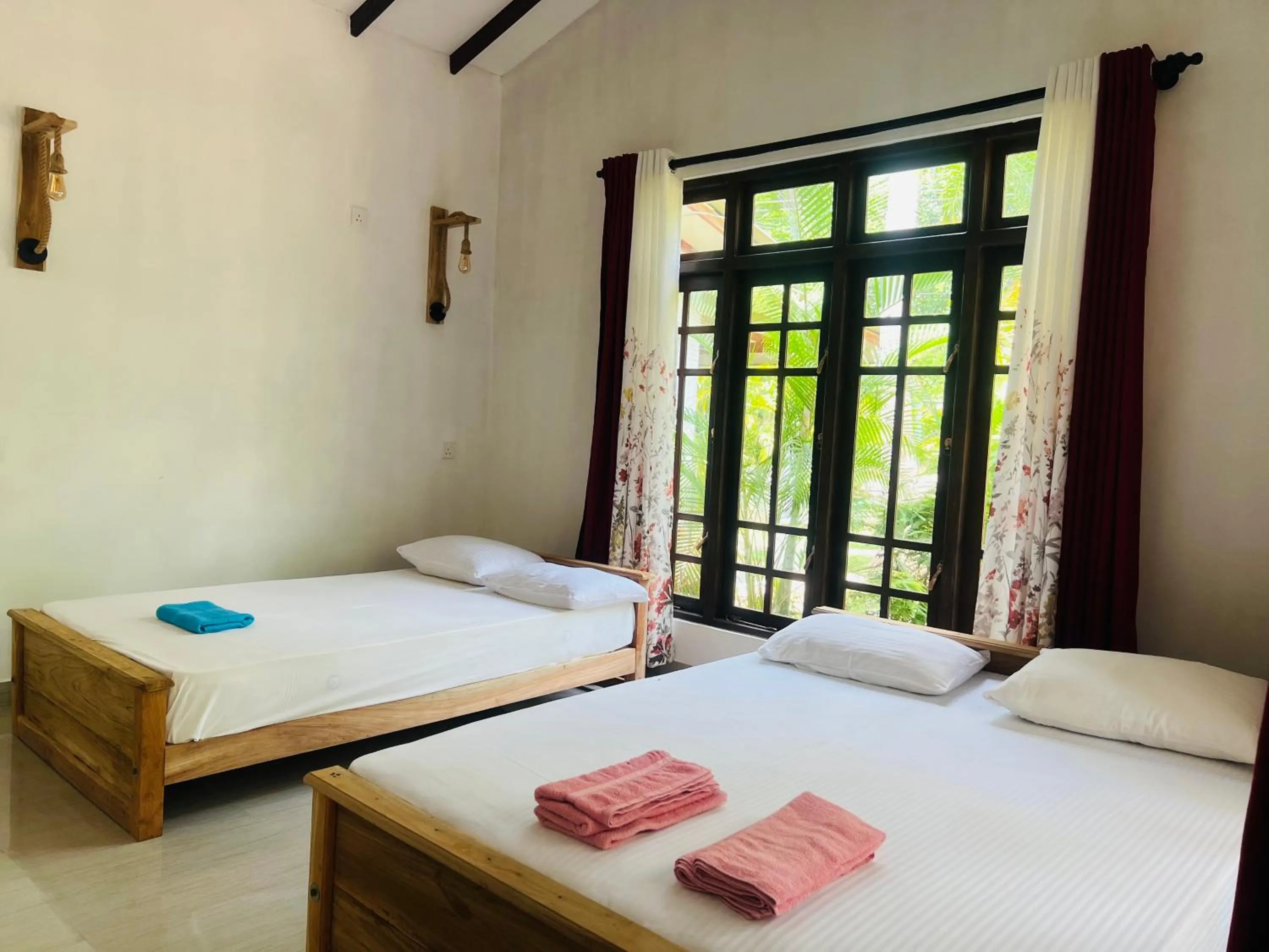 Photo of the whole room, Bed in Harini Villa