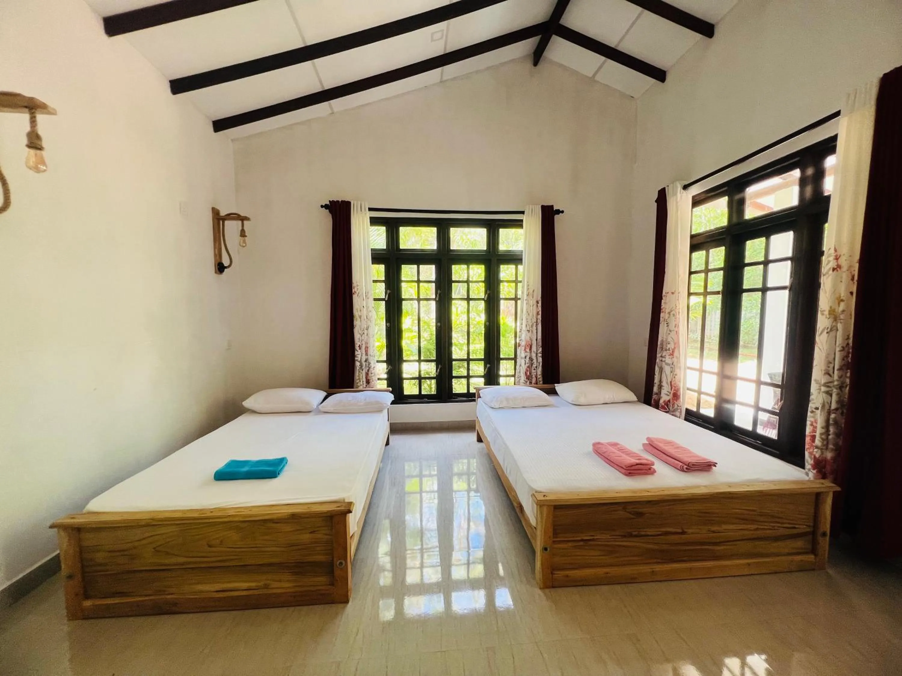 Photo of the whole room, Bed in Harini Villa