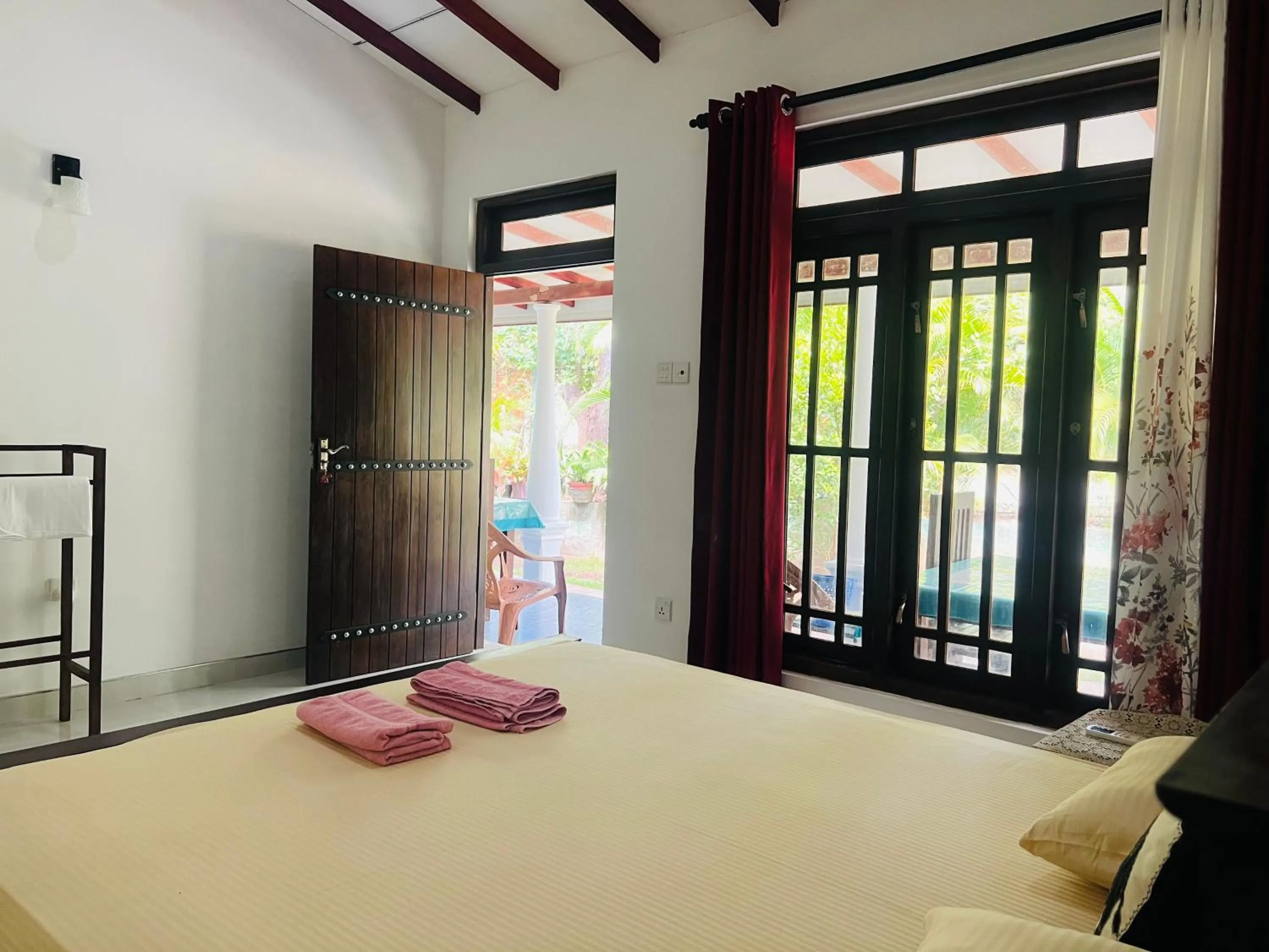 Photo of the whole room, Bed in Harini Villa