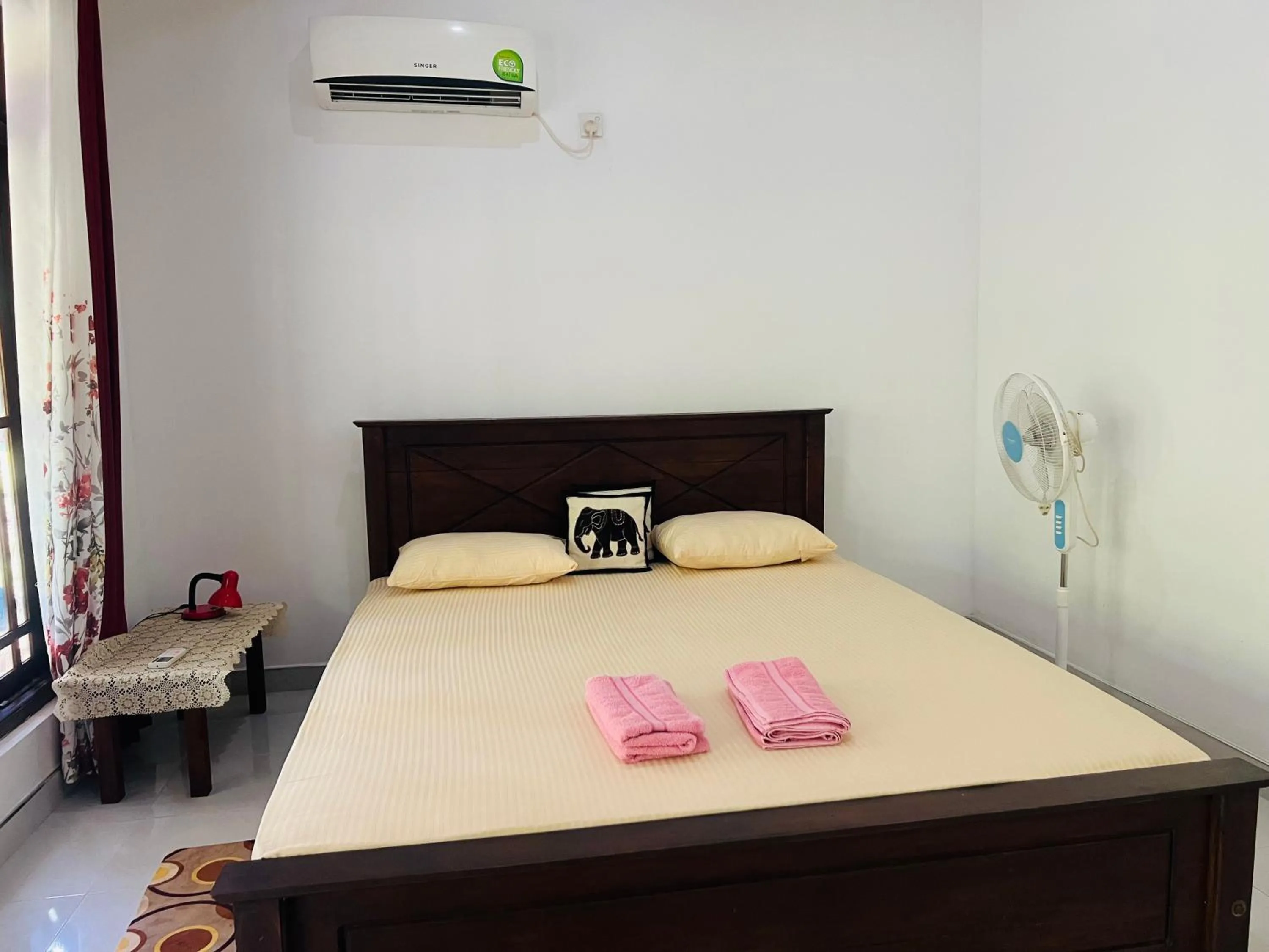 Photo of the whole room, Bed in Harini Villa