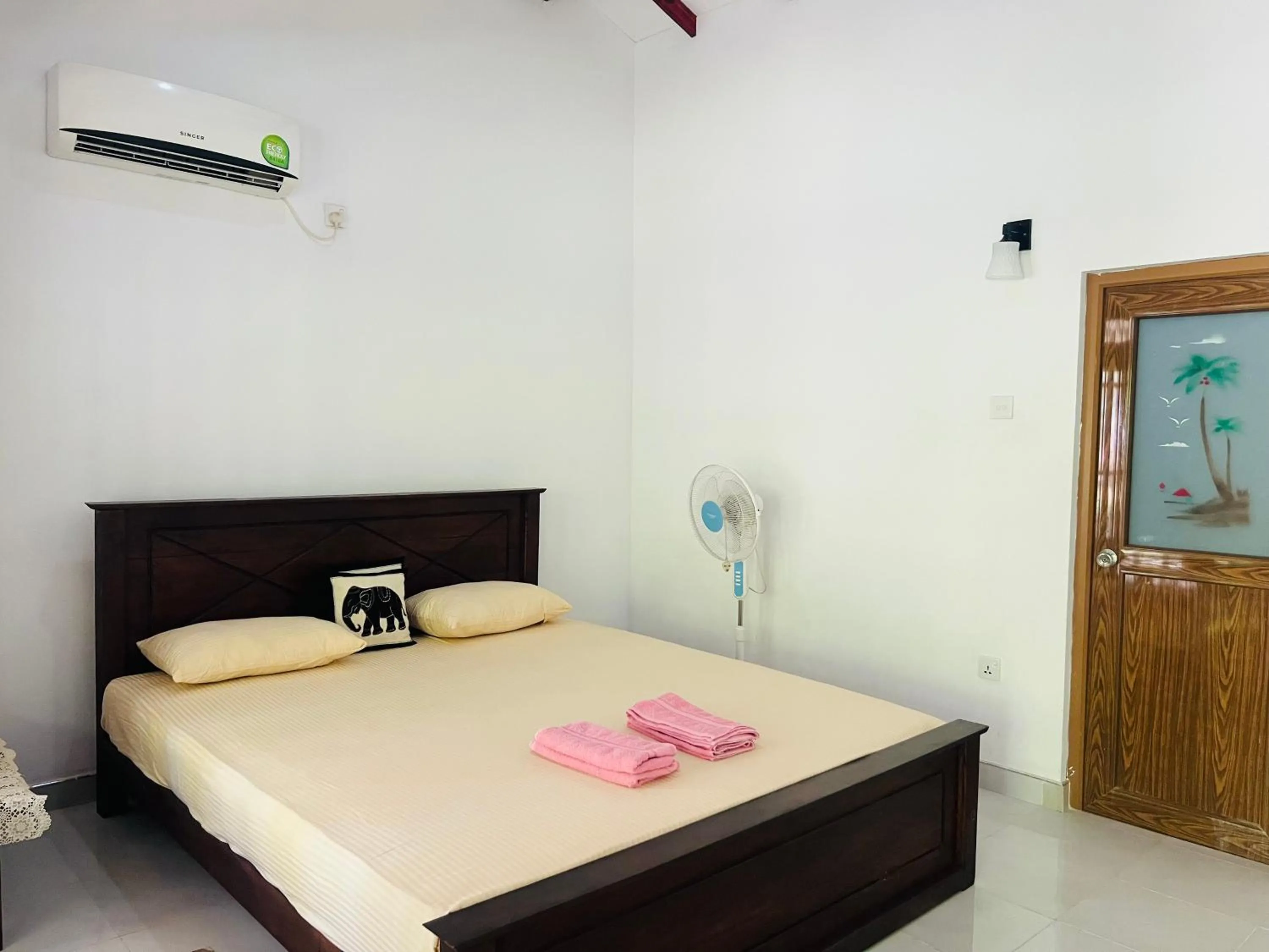 Photo of the whole room, Bed in Harini Villa