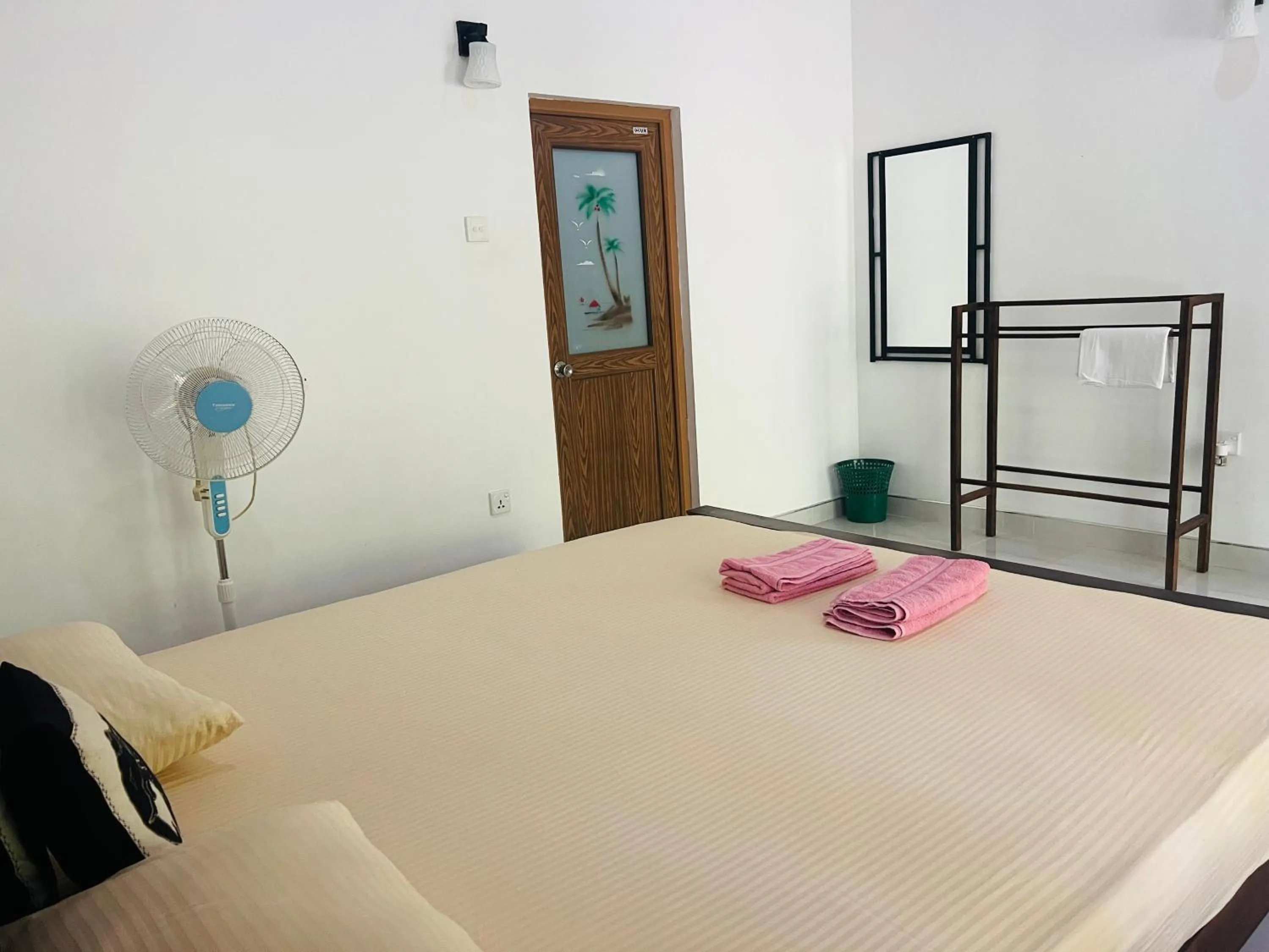 Photo of the whole room, Bed in Harini Villa
