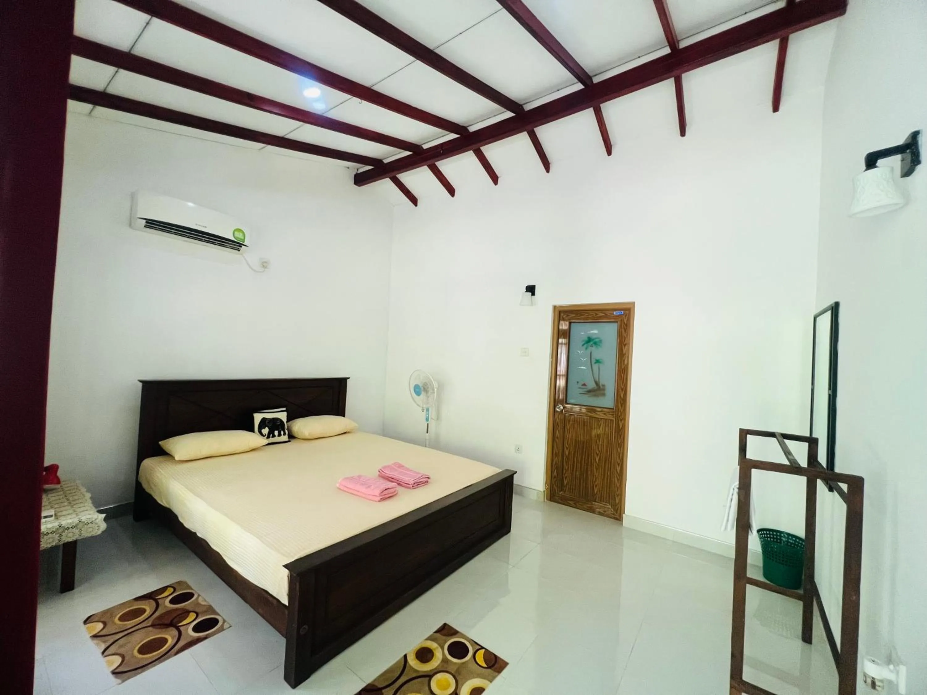 Photo of the whole room, Bed in Harini Villa