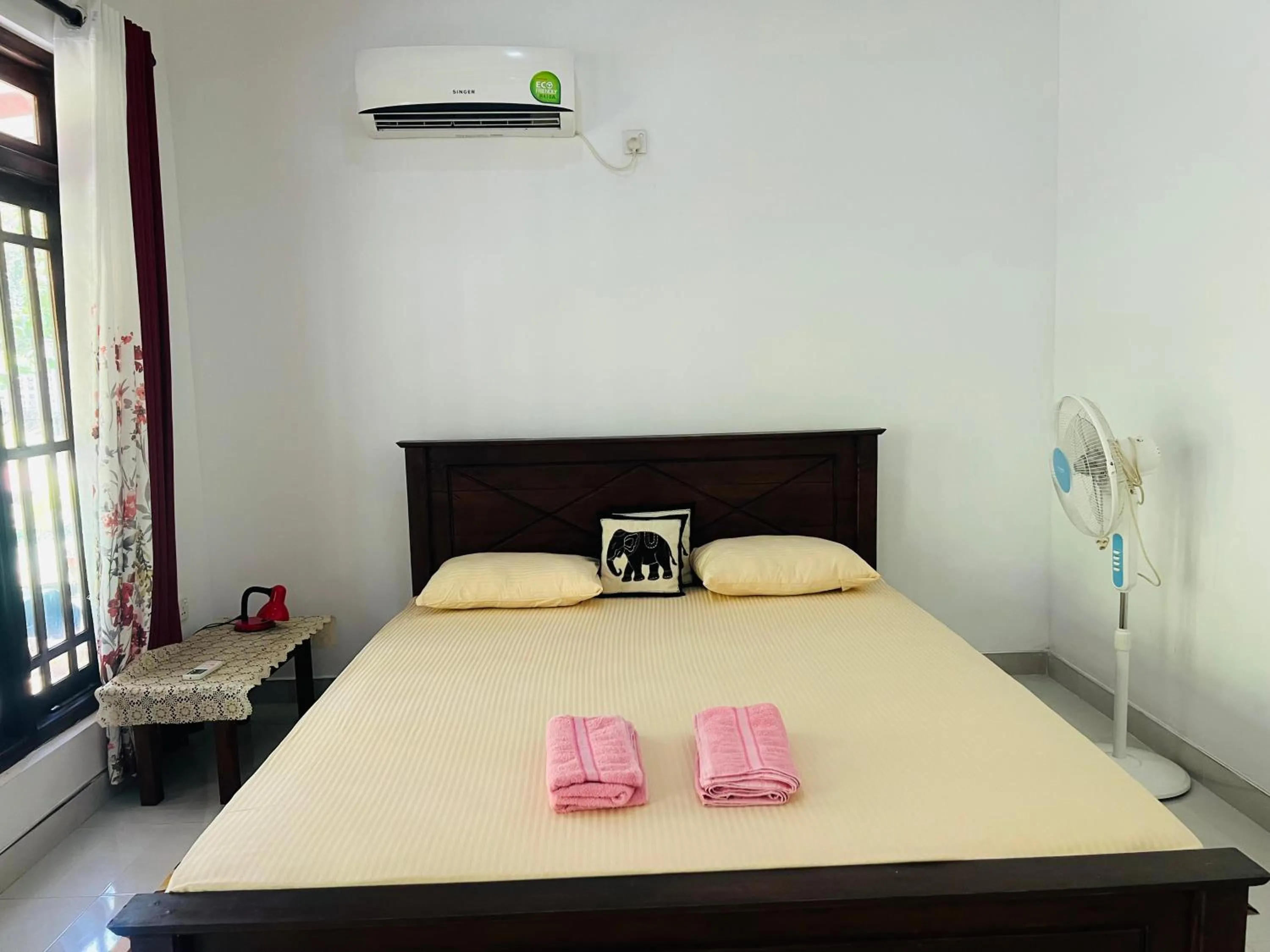 Photo of the whole room, Bed in Harini Villa