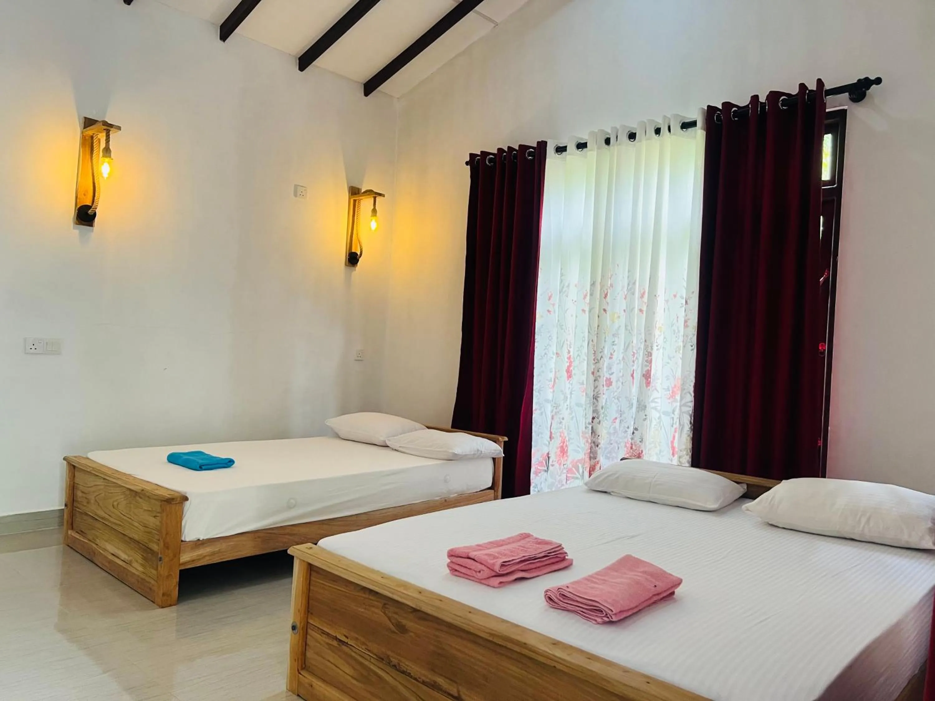 Photo of the whole room, Bed in Harini Villa