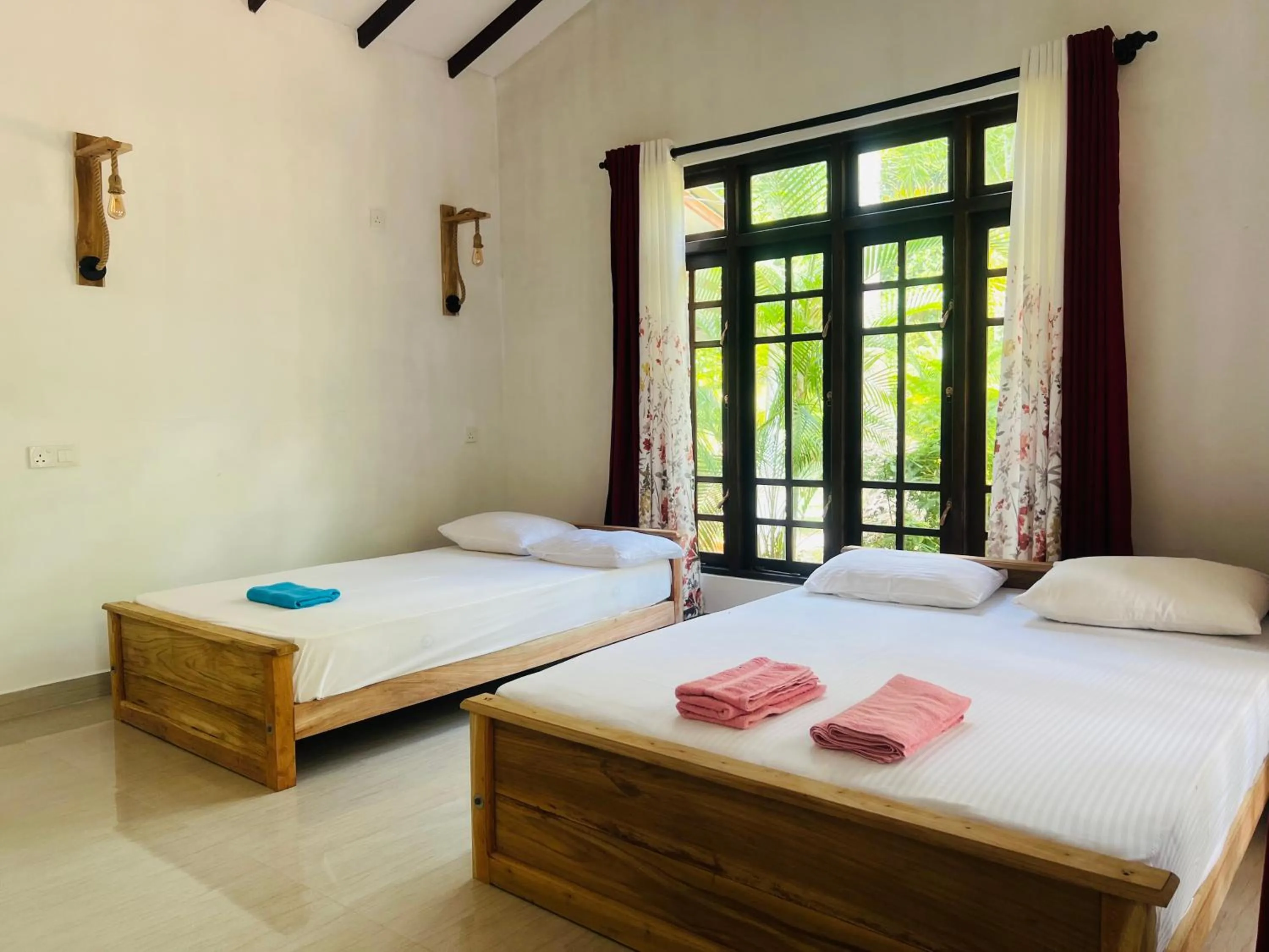 Bed in Harini Villa