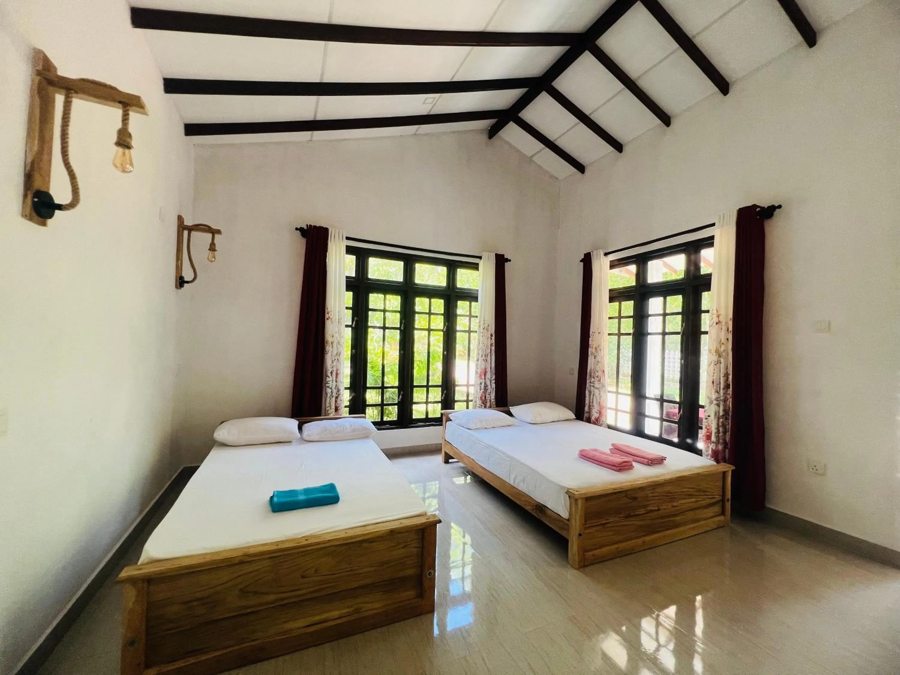 Photo of the whole room, Bed in Harini Villa