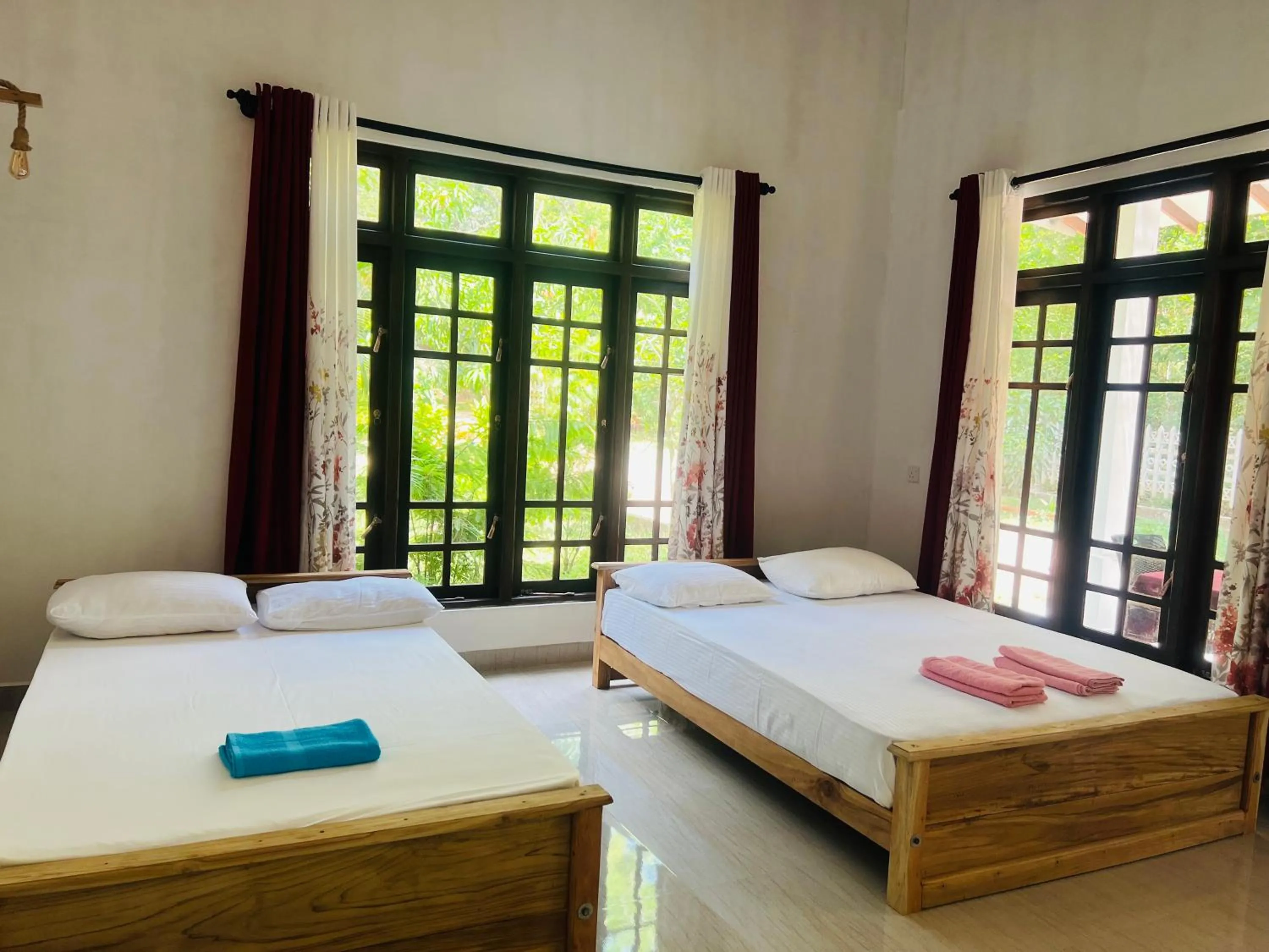 Photo of the whole room, Bed in Harini Villa