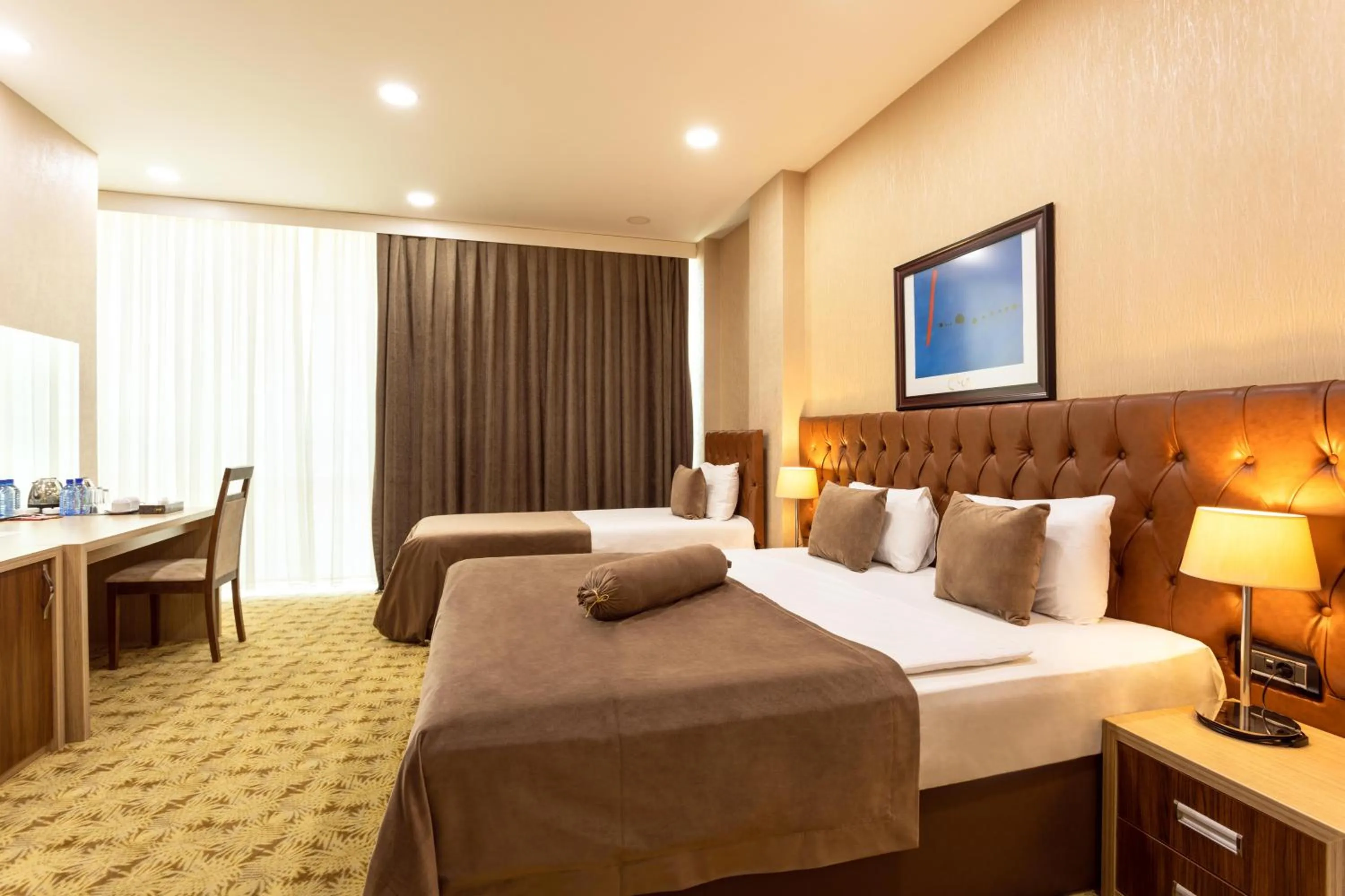 Bed in West Shine Hotel