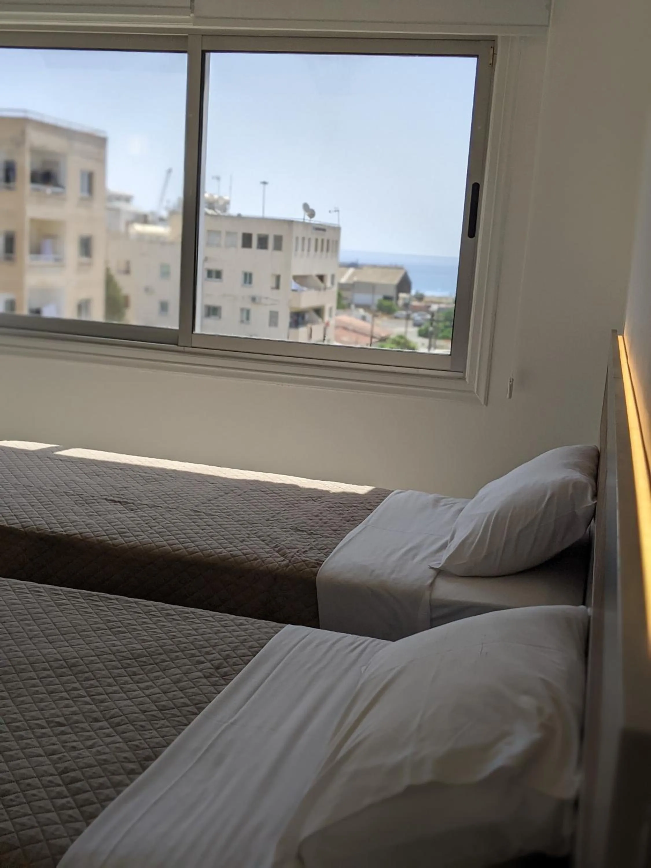 Bed in Sunflower Hotel Apartments