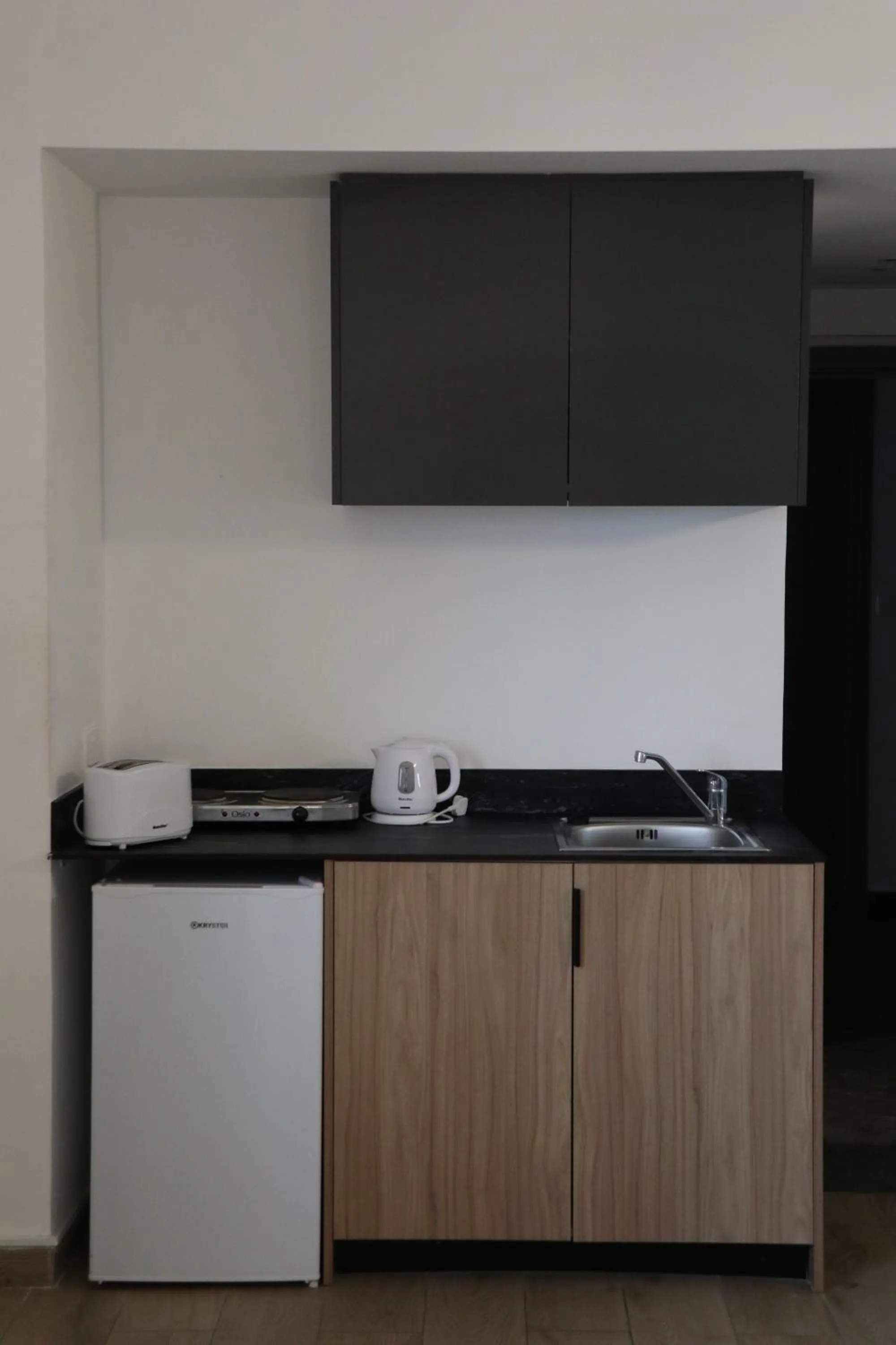Kitchen or kitchenette in Sunflower Hotel Apartments
