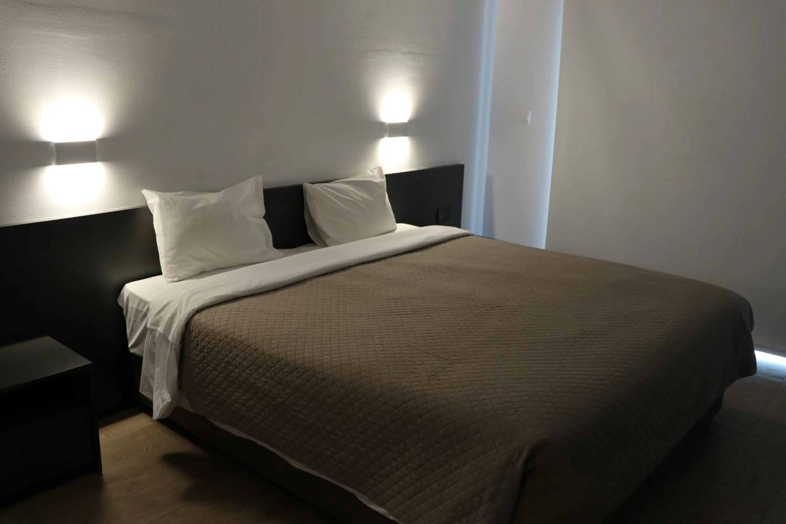 Bed in Sunflower Hotel Apartments