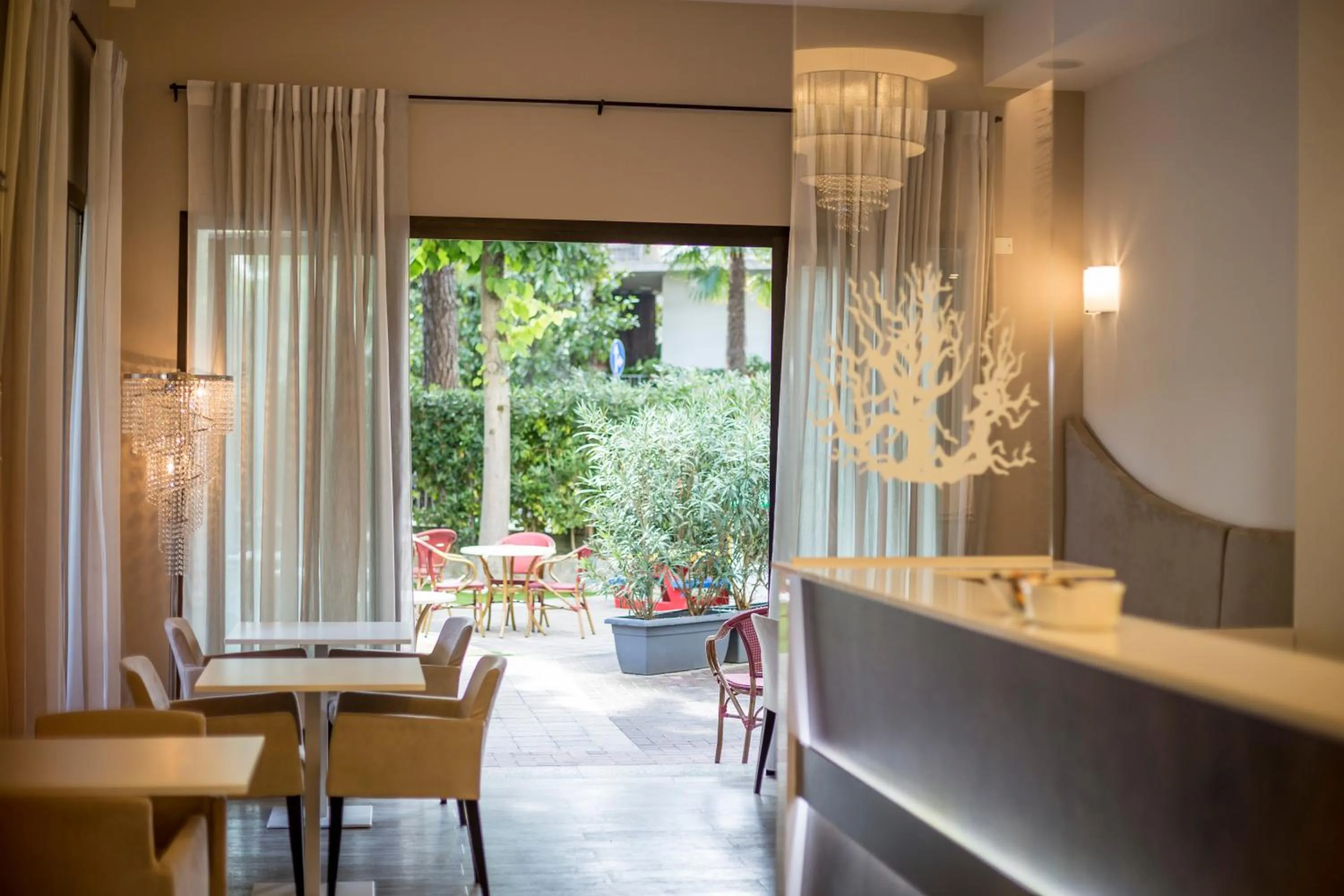 Communal lounge/ TV room in Hotel Corallo