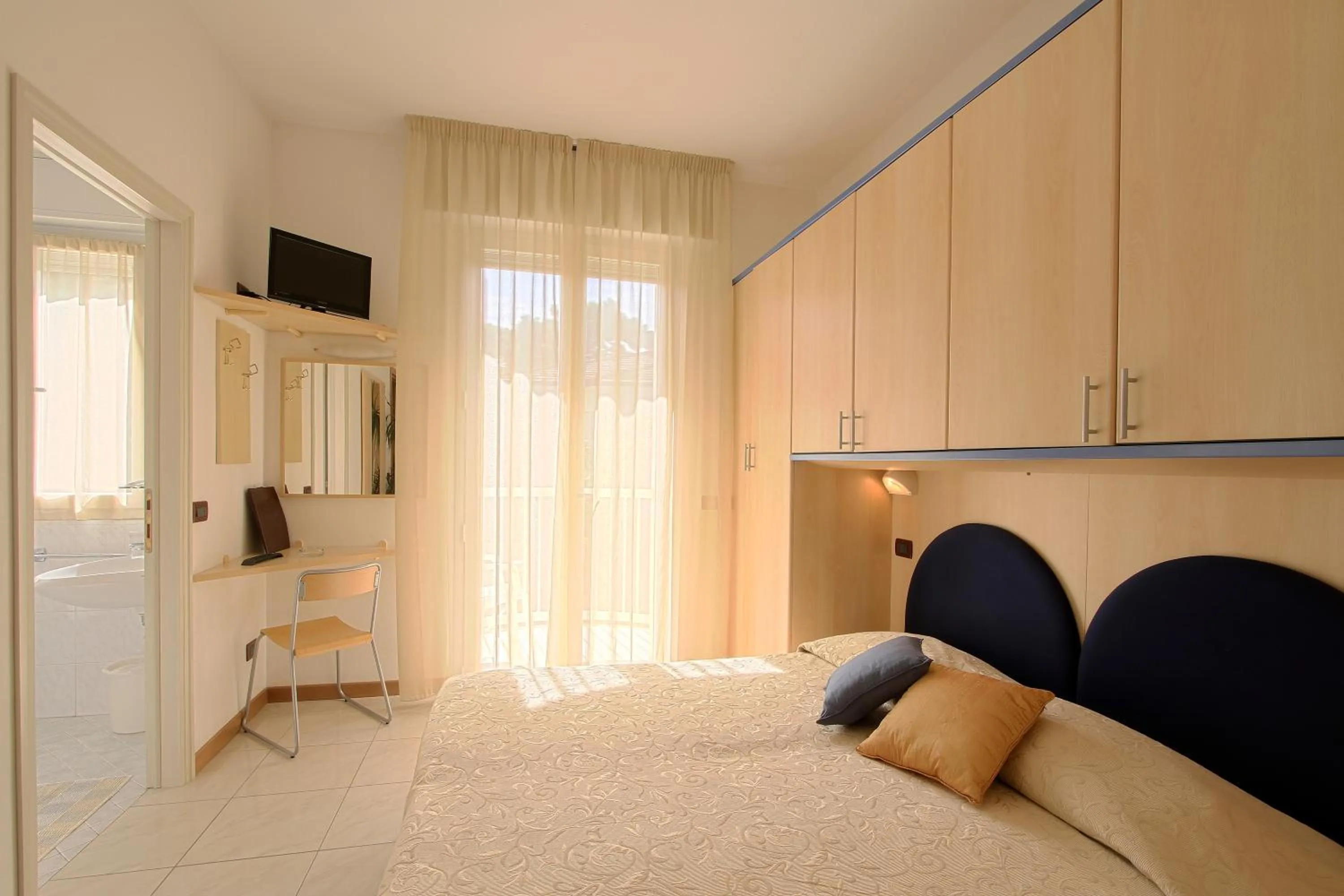 Bed in Hotel Corallo