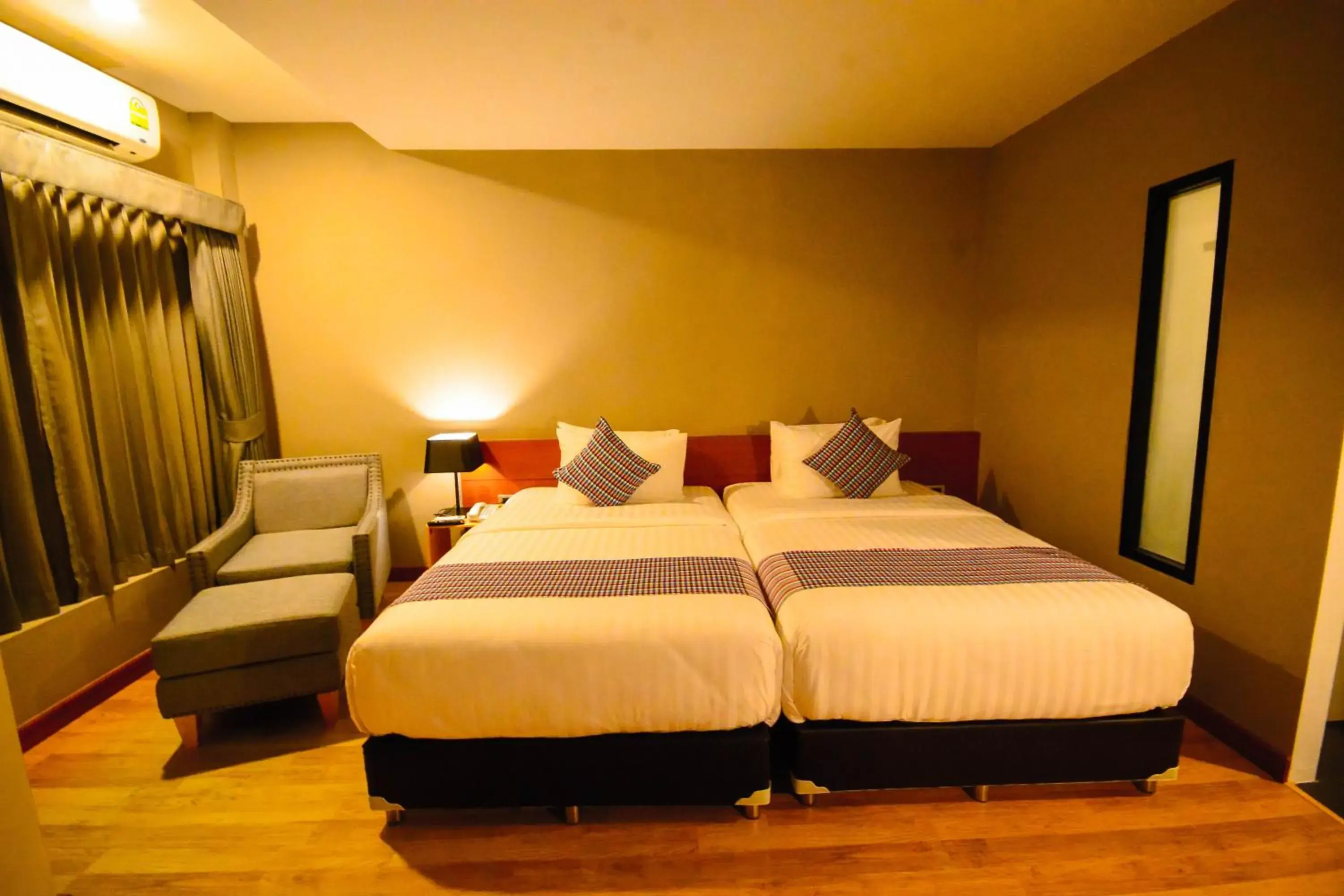 Photo of the whole room, Bed in Comet Hotel Surat Thani Photo of the whole room, Bed in Comet Hotel Surat Thani