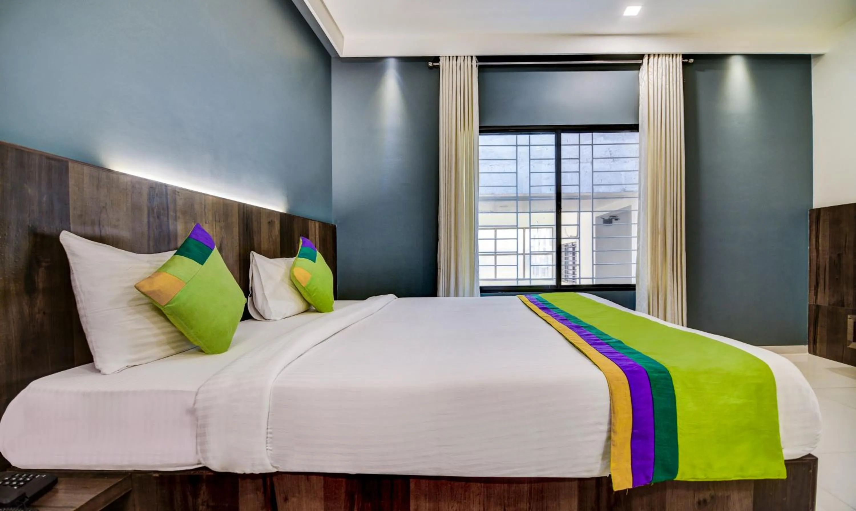 Bedroom, Bed in Treebo Shree Sai Suites