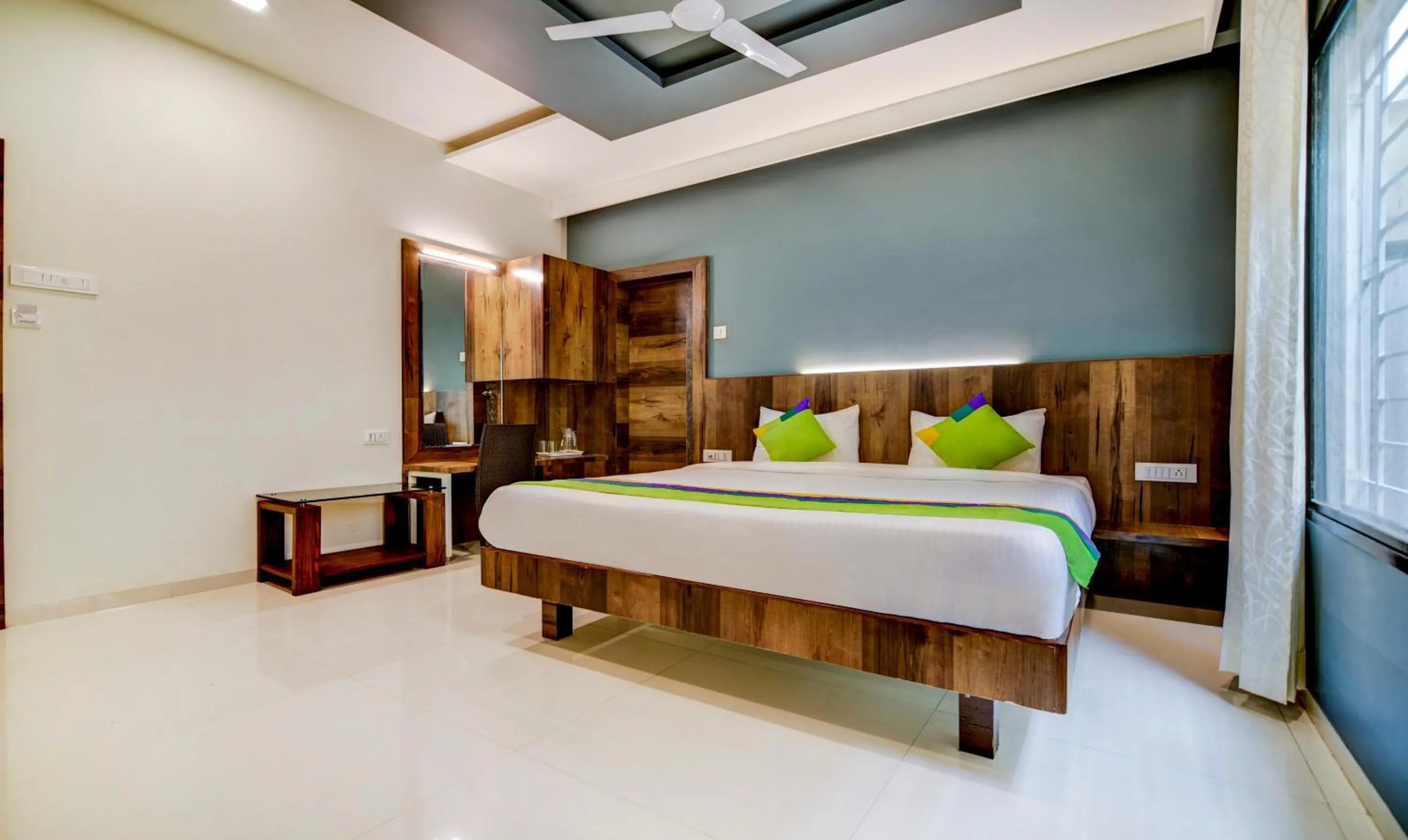Bedroom, Bed in Treebo Shree Sai Suites