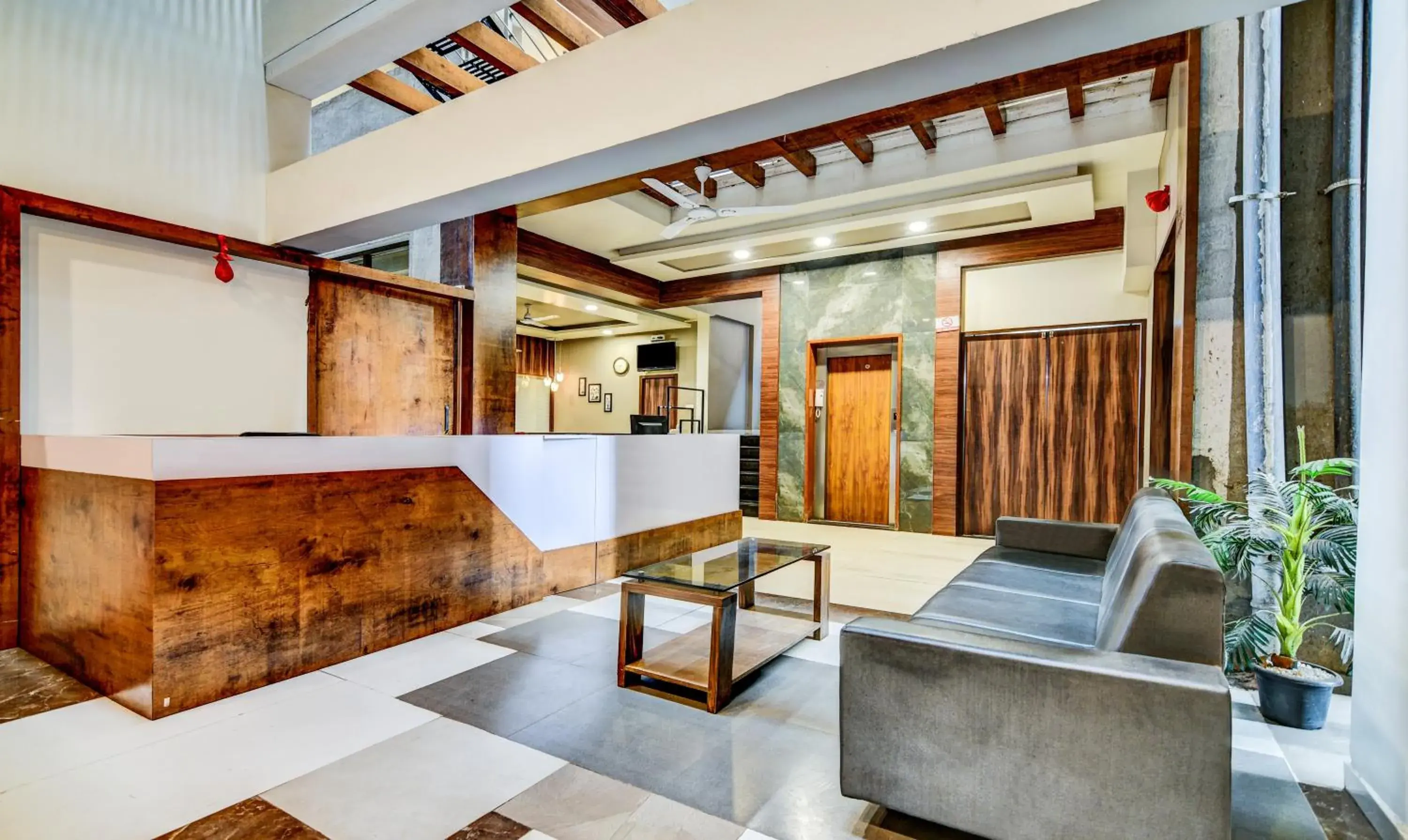 Lobby or reception in Treebo Shree Sai Suites - 2km from Mahalaxmi Temple Lobby or reception in Treebo Shree Sai Suites - 2km from Mahalaxmi Temple