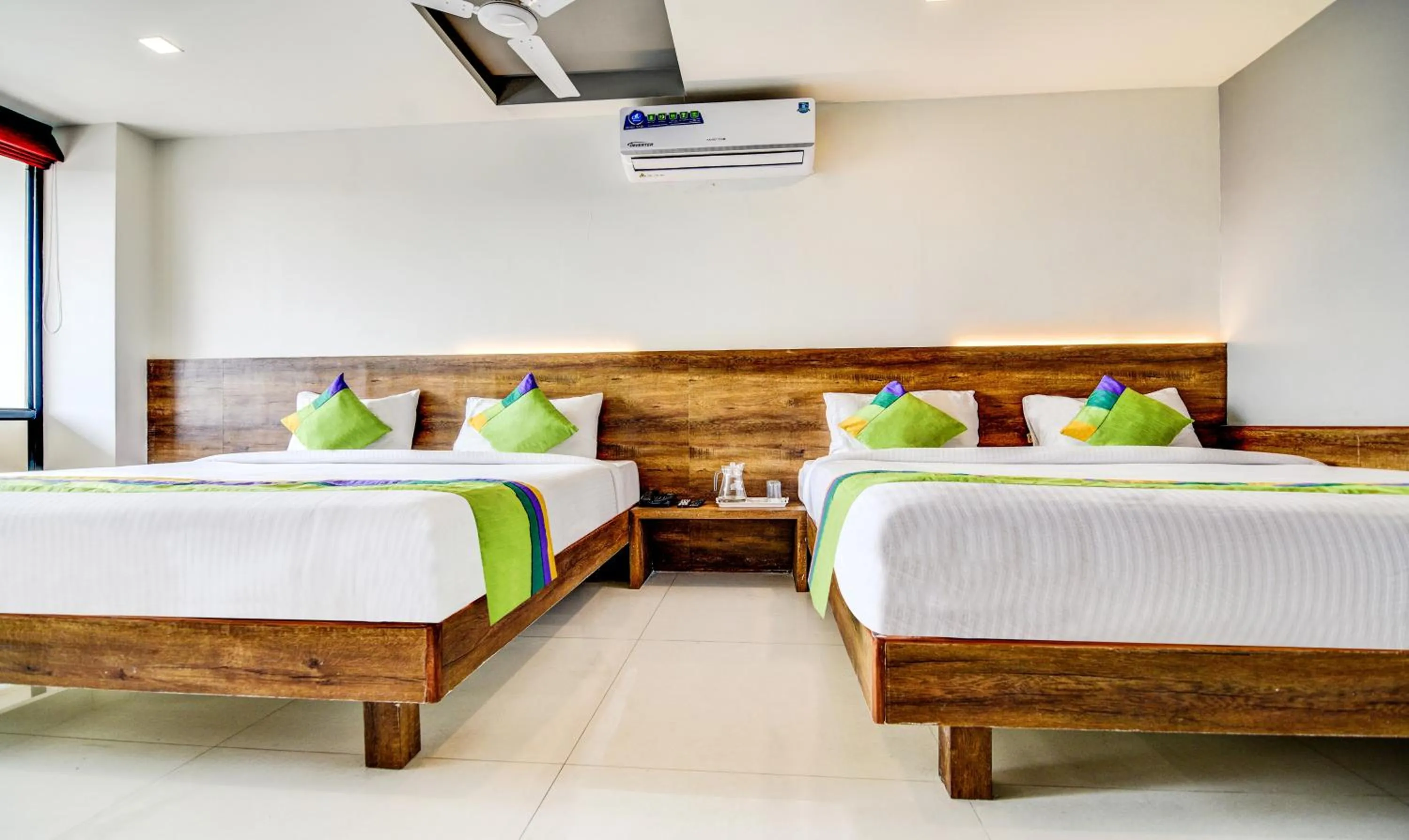 Bedroom, Bed in Treebo Shree Sai Suites