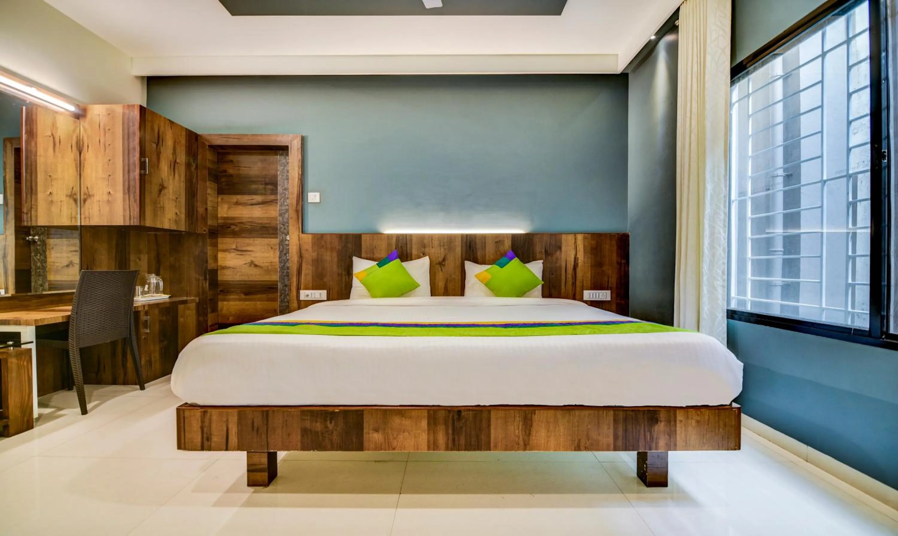 Bedroom, Bed in Treebo Shree Sai Suites