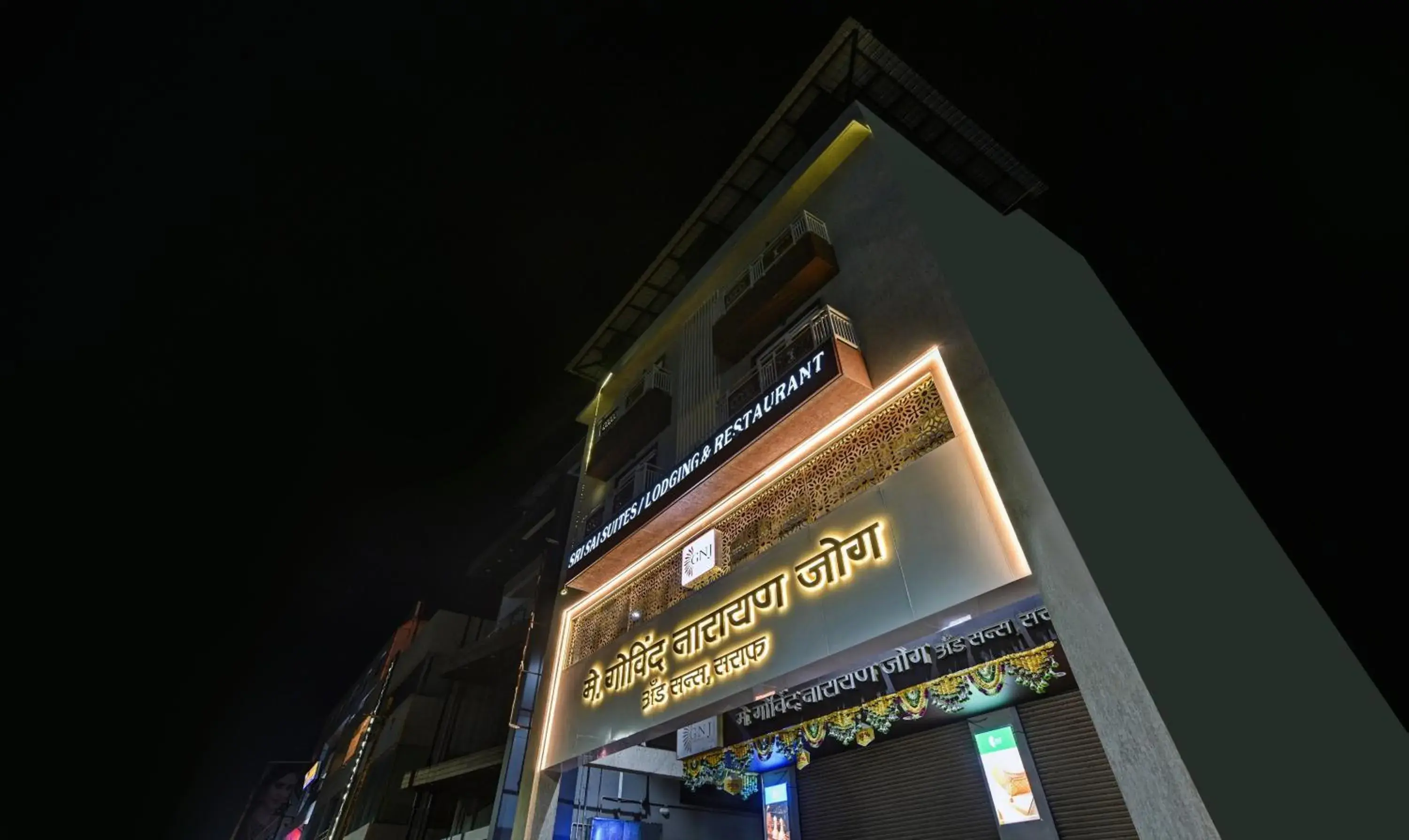 Property building in Treebo Shree Sai Suites - 2km from Mahalaxmi Temple Property building in Treebo Shree Sai Suites - 2km from Mahalaxmi Temple