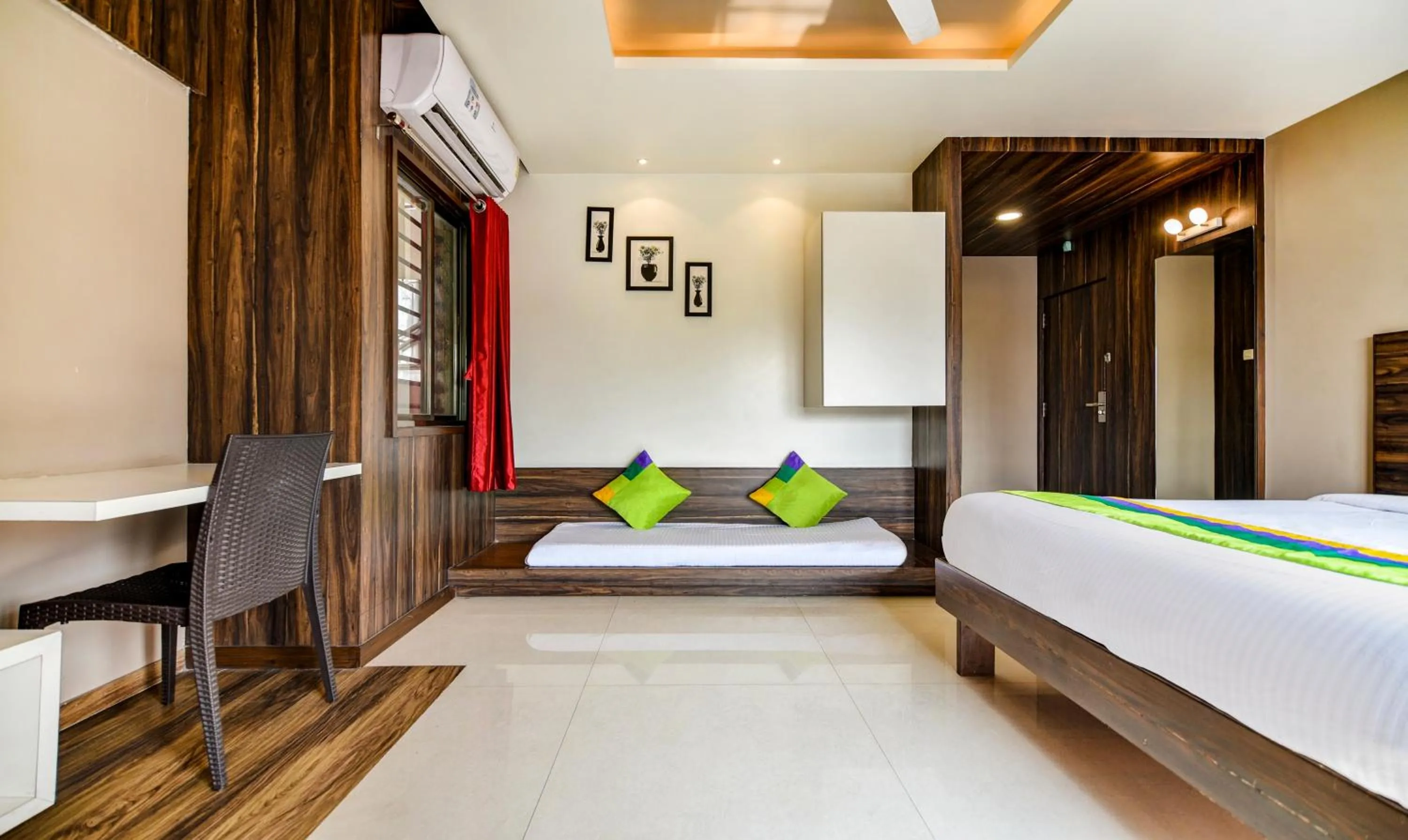 Bedroom, Bed in Treebo Shree Sai Suites