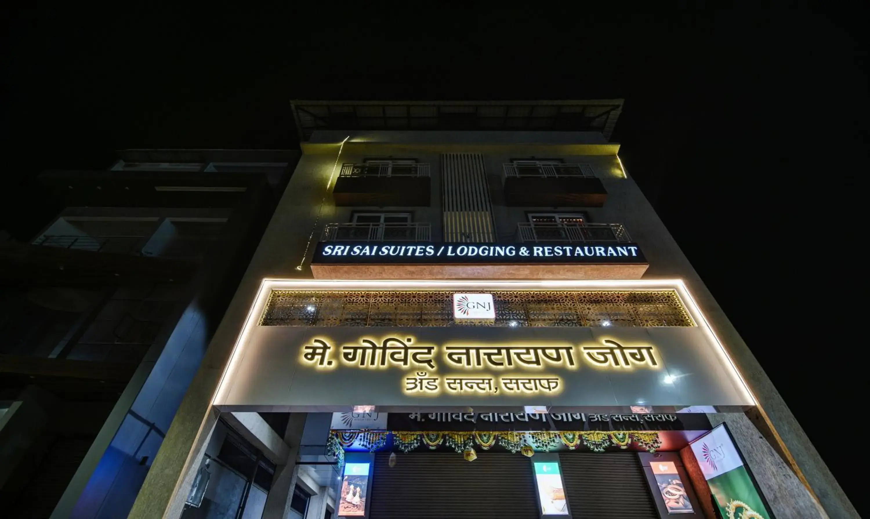 Property building in Treebo Shree Sai Suites - 2km from Mahalaxmi Temple Property building in Treebo Shree Sai Suites - 2km from Mahalaxmi Temple