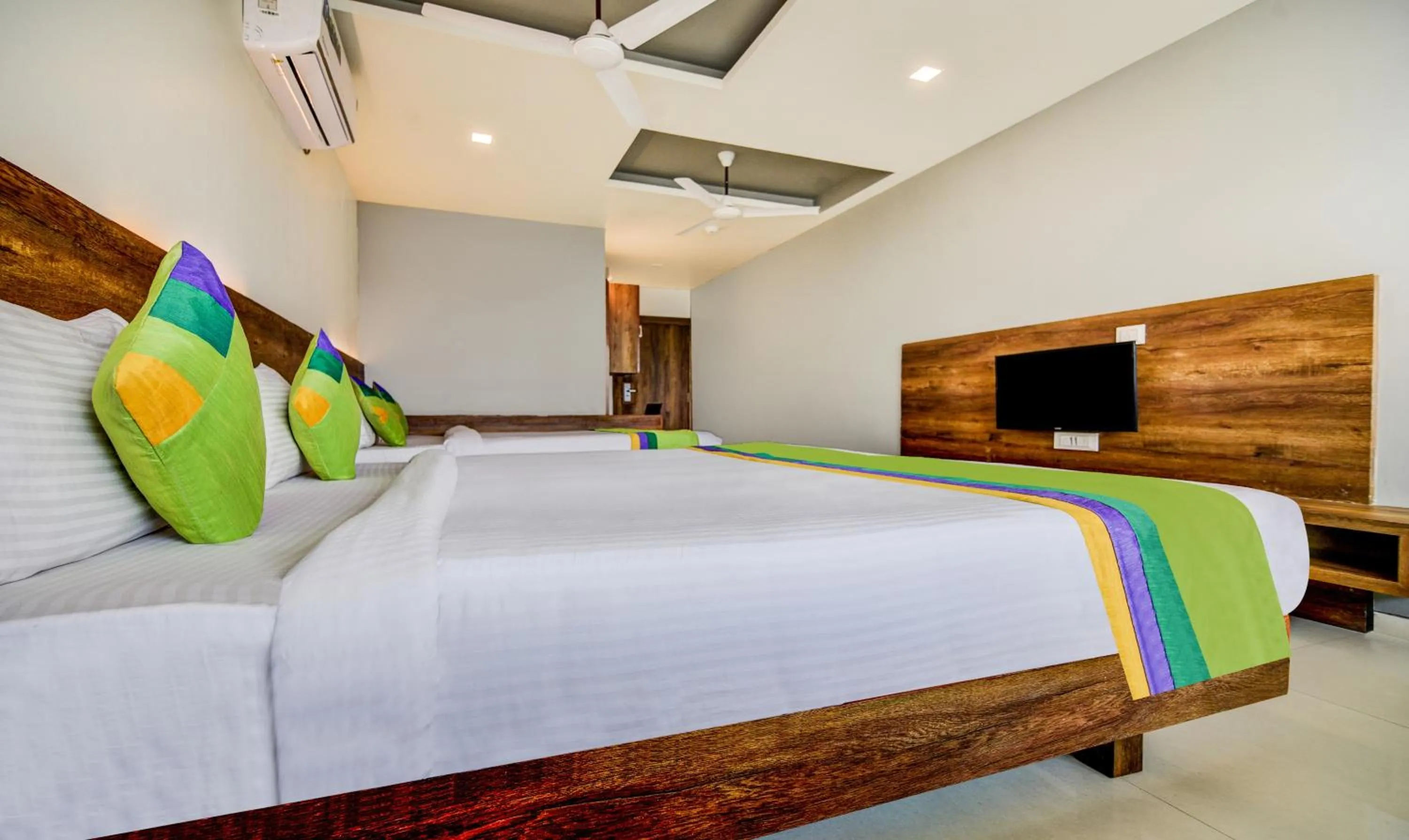 Bedroom, Bed in Treebo Shree Sai Suites