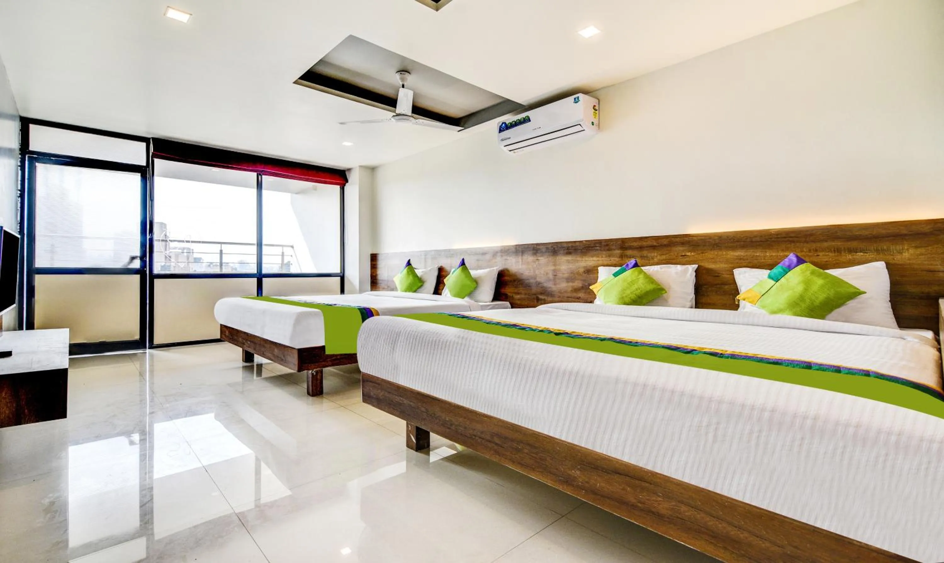 Bedroom, Bed in Treebo Shree Sai Suites