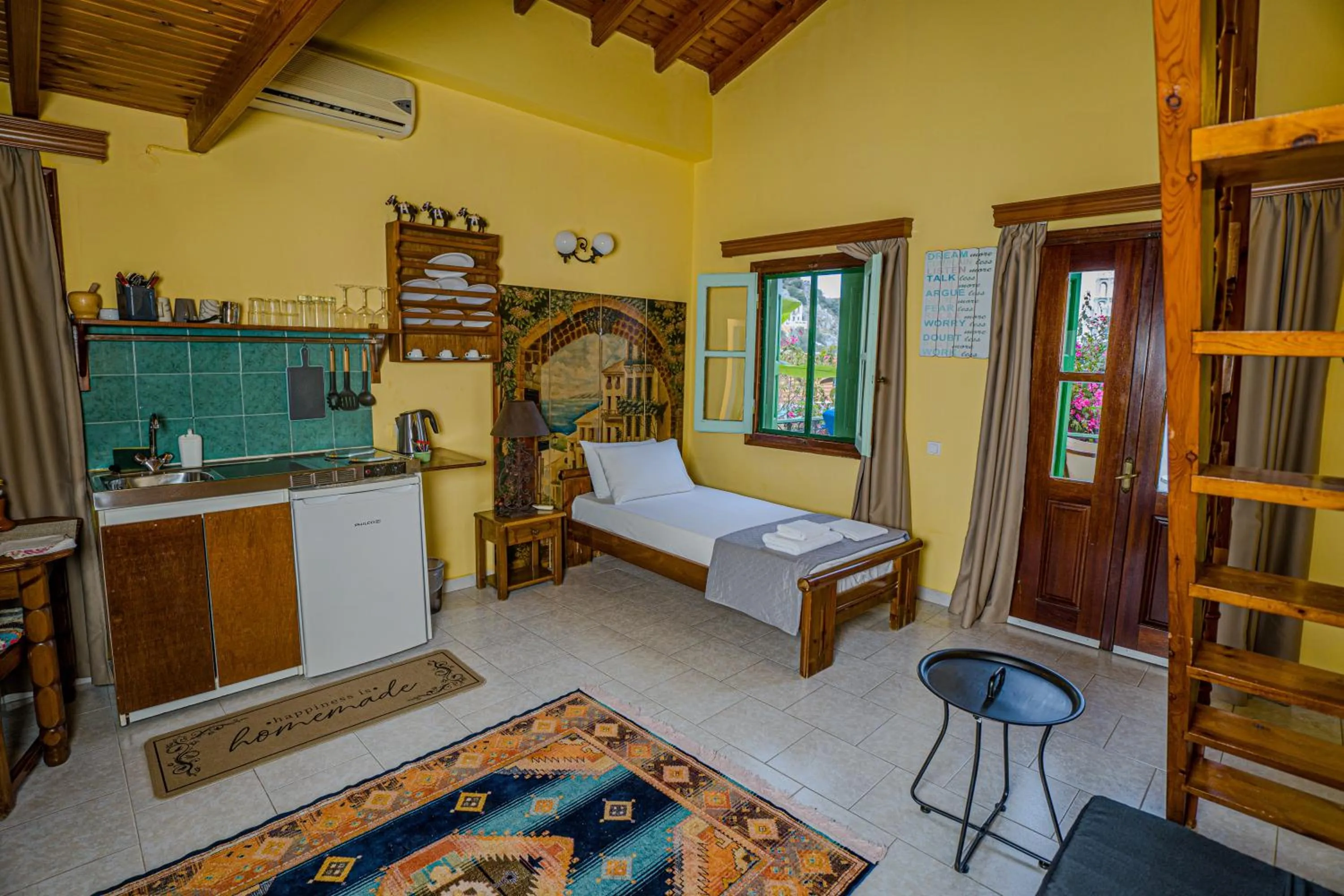 Kitchen or kitchenette, Bed in Symi Garden Studios