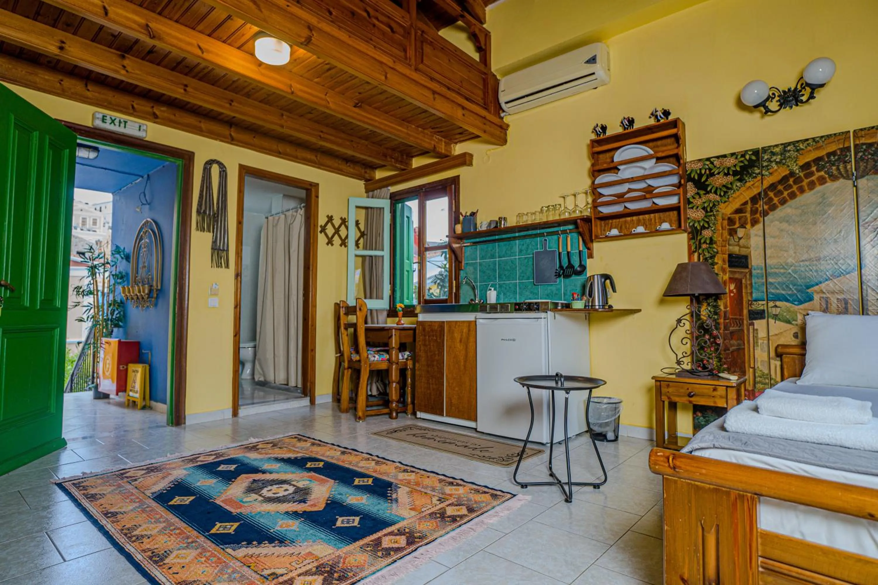 Kitchen or kitchenette, Bed in Symi Garden Studios