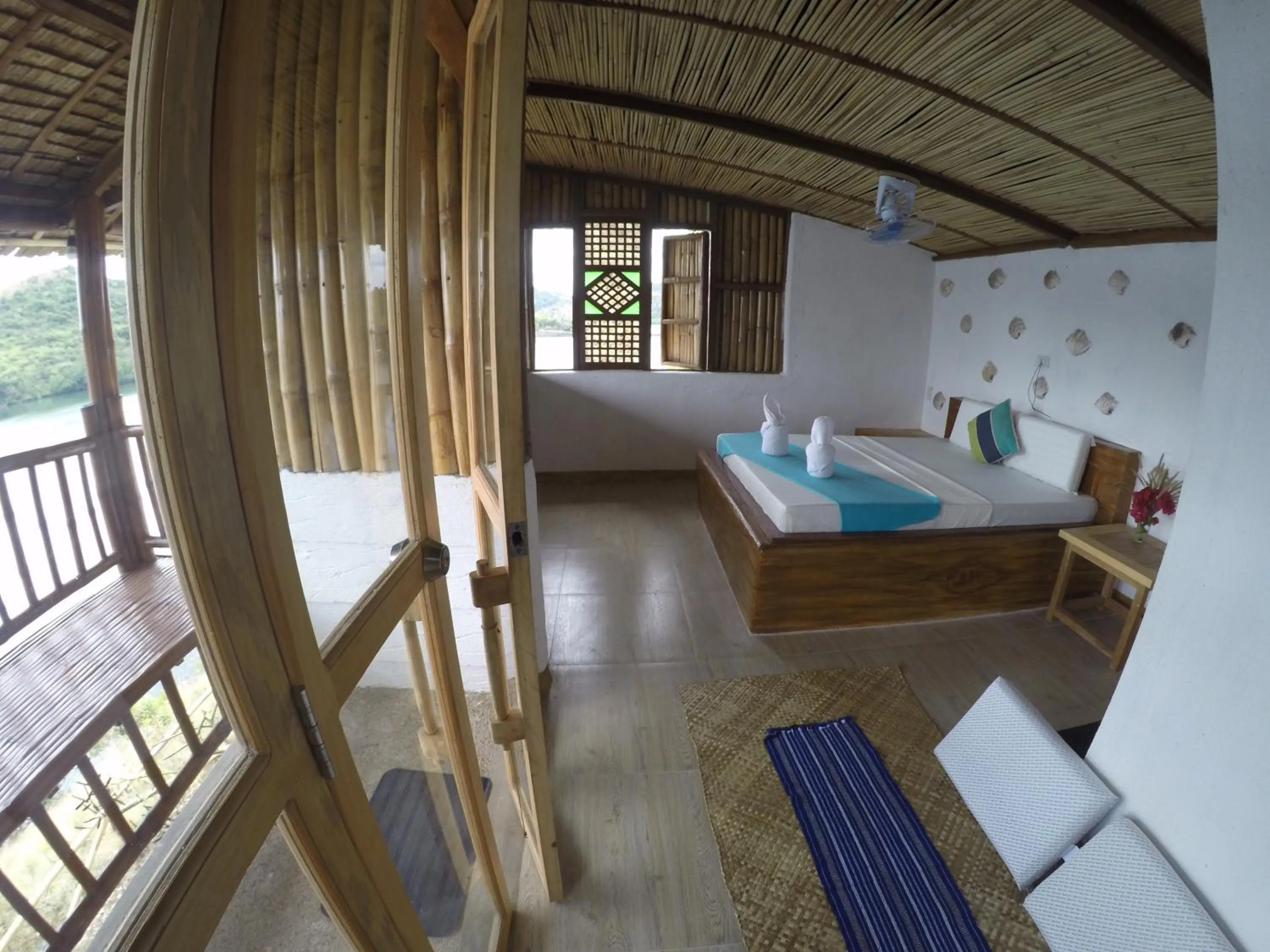 Bed in Borac Bay Bungalows Hotel and Resort