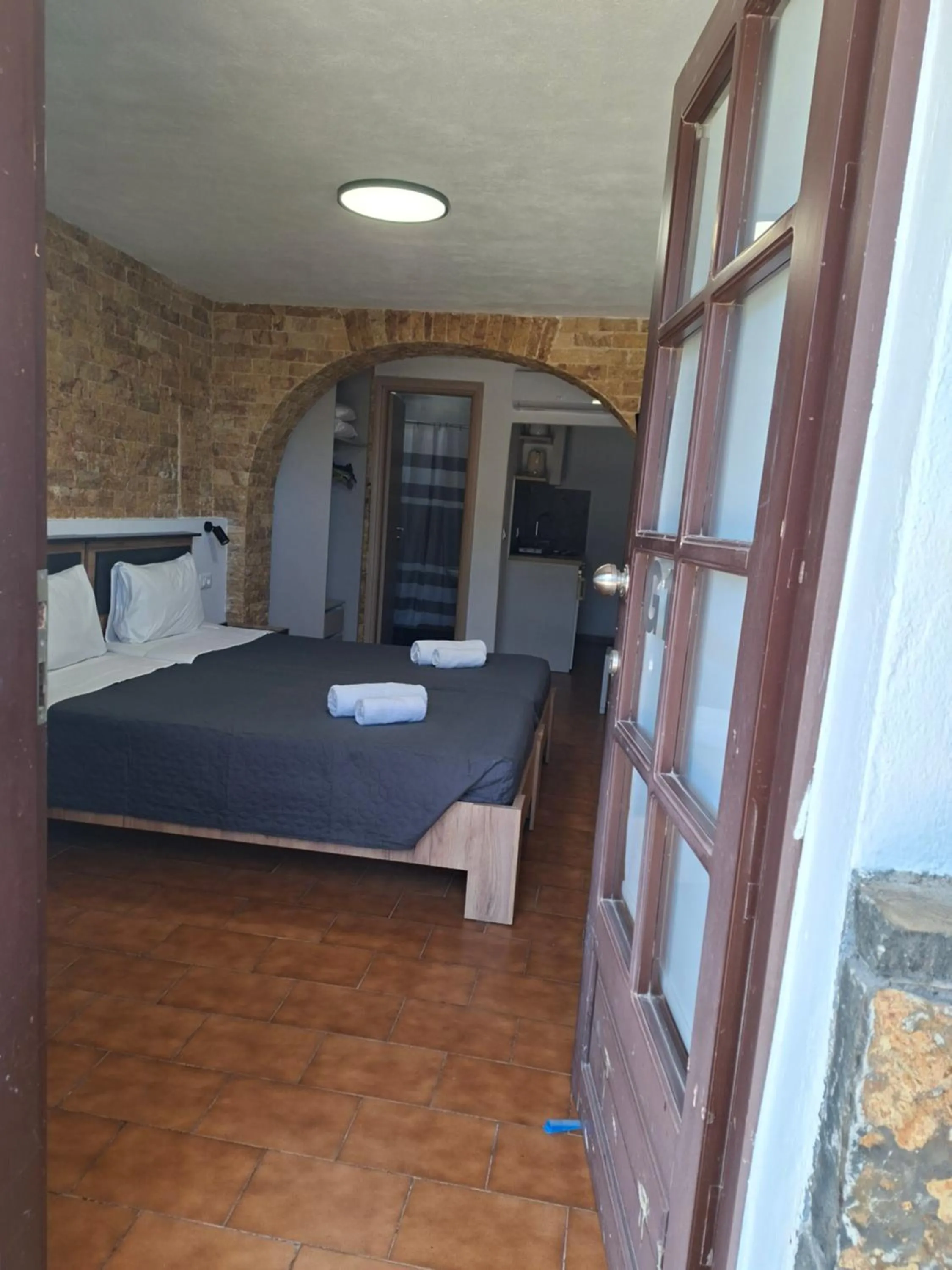 Bed in Corali Studios & Portobello Apartments
