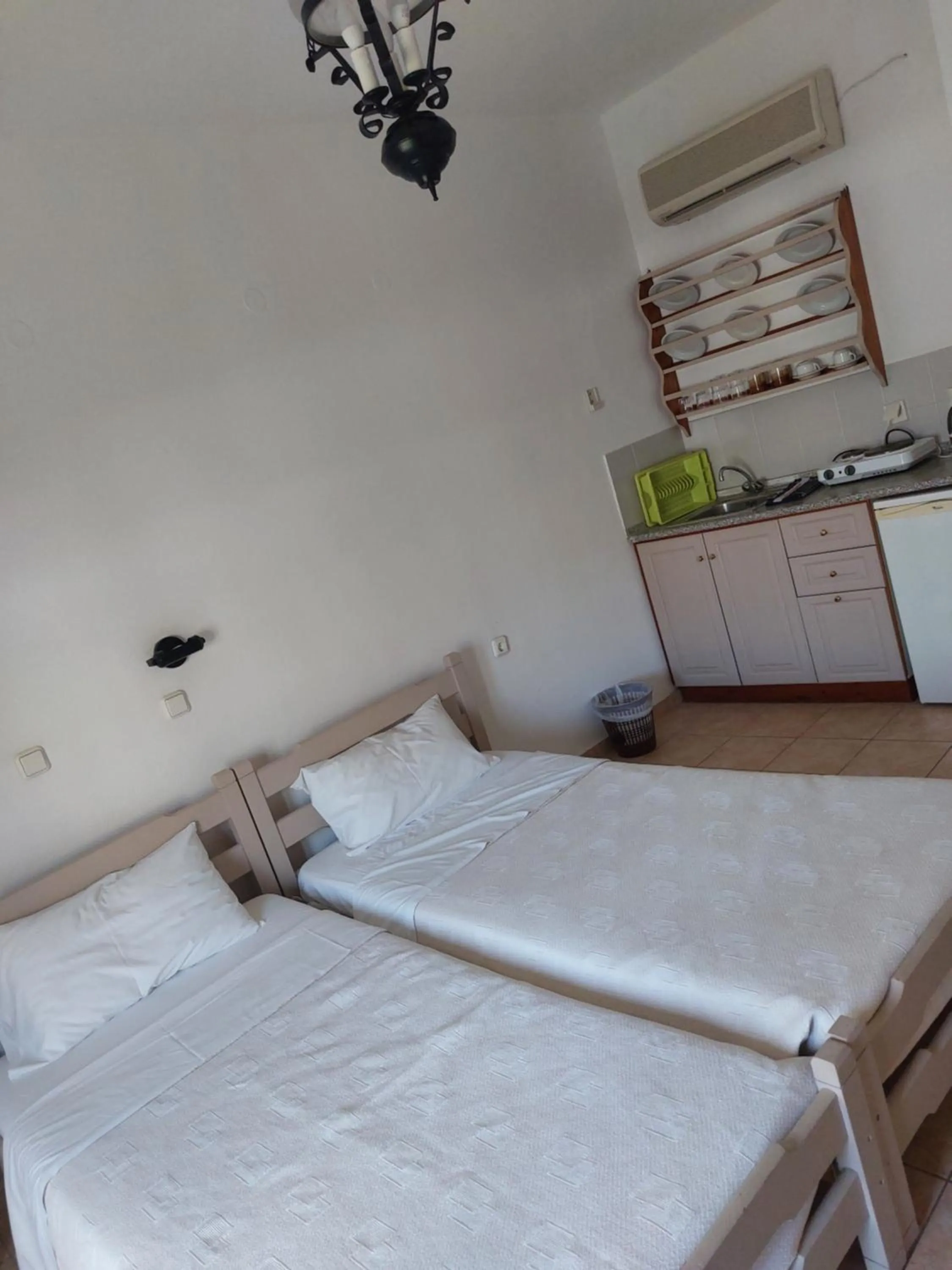 Bed in Corali Studios & Portobello Apartments