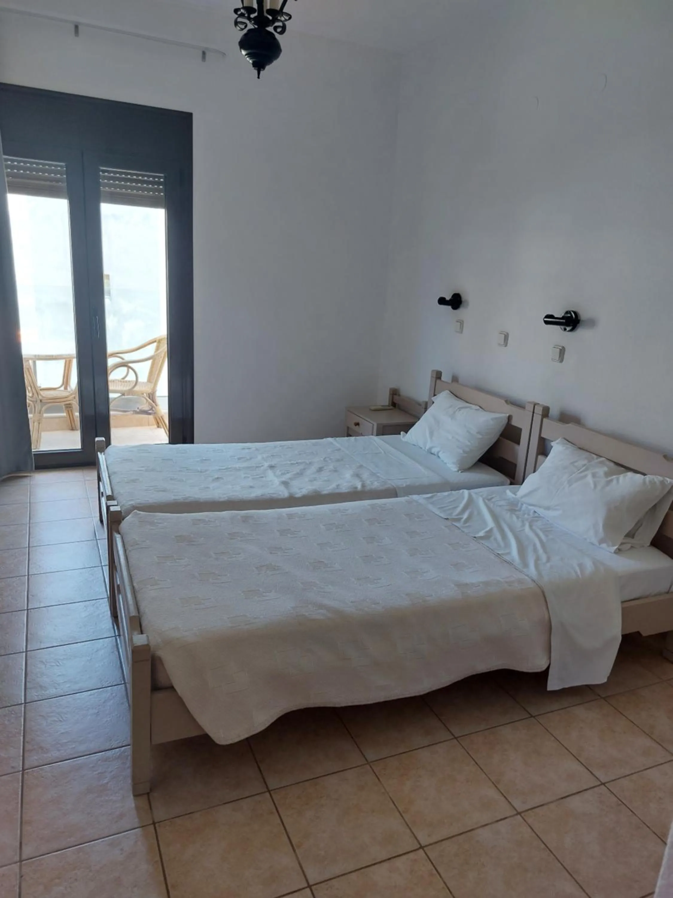 Bed in Corali Studios & Portobello Apartments