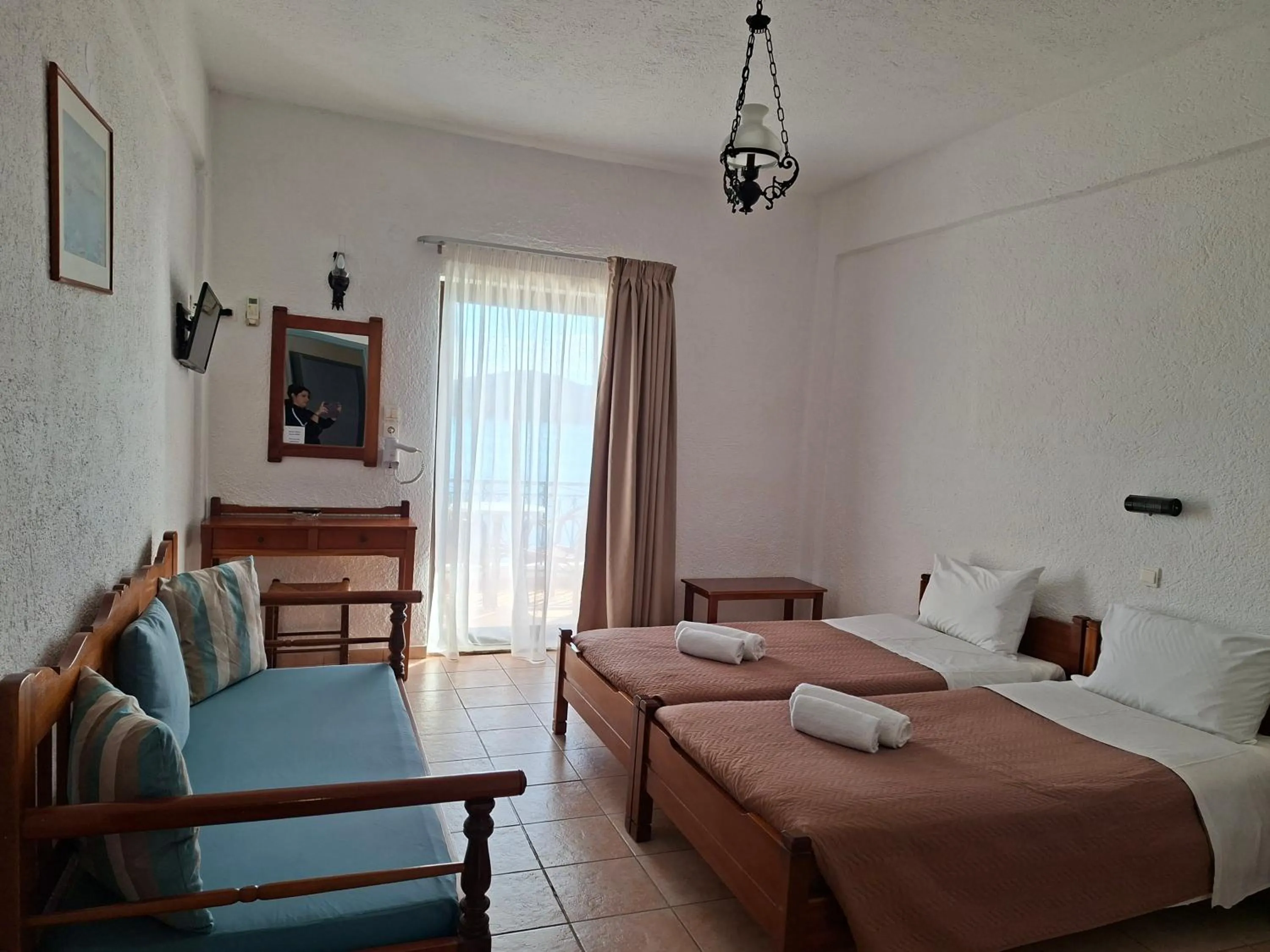 Bed in Corali Studios & Portobello Apartments