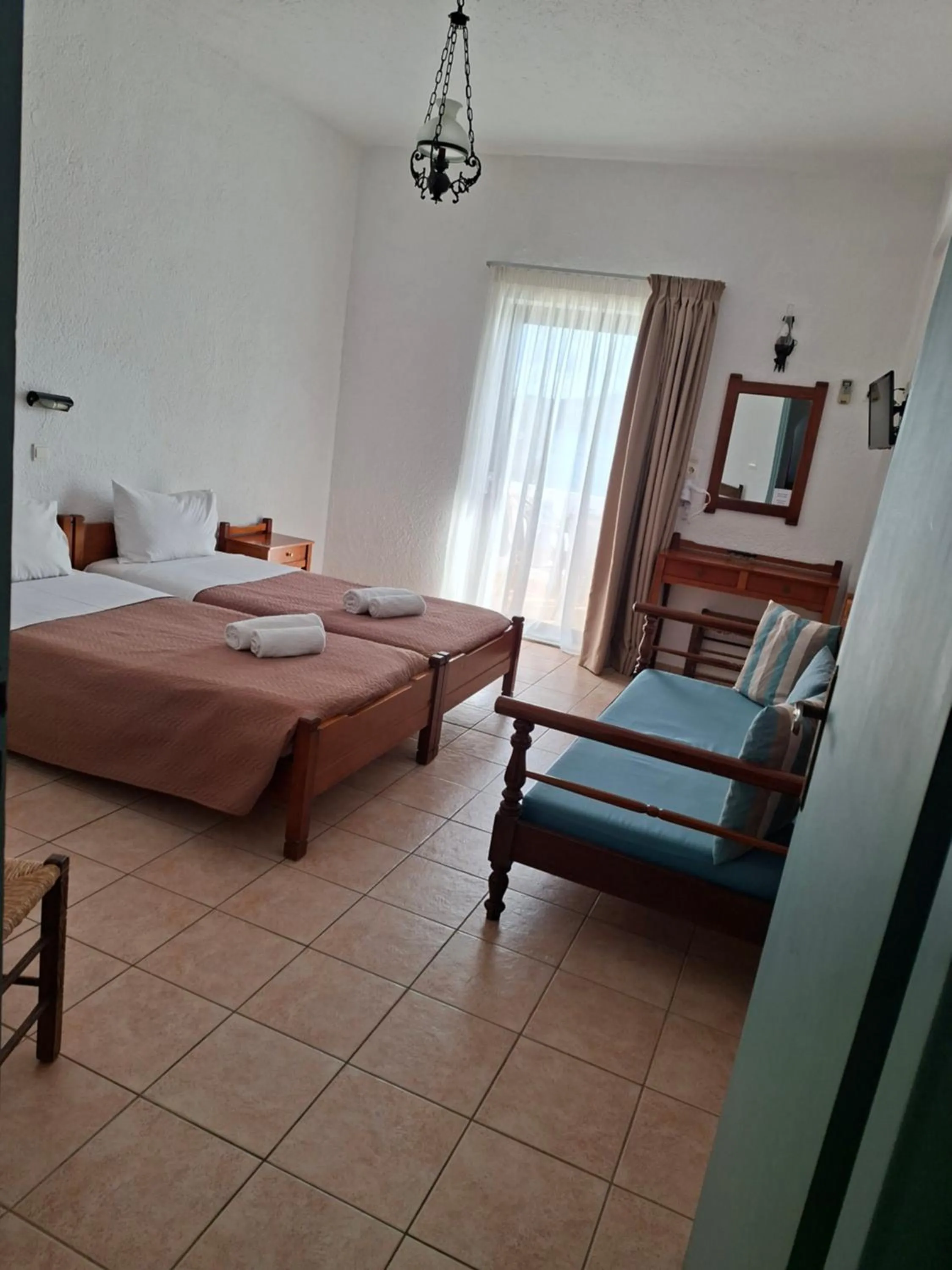 Bed in Corali Studios & Portobello Apartments
