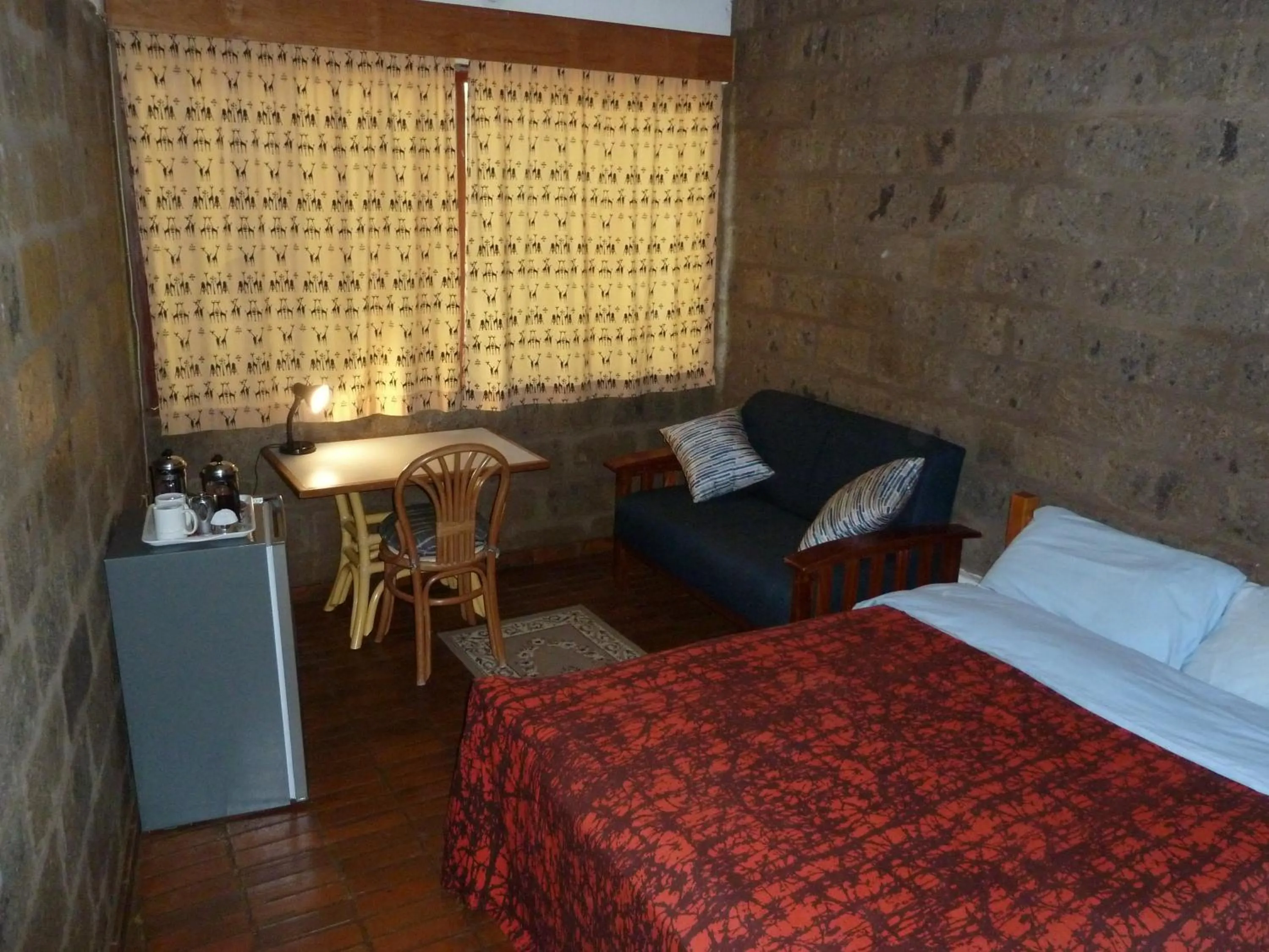 Photo of the whole room, Bed in Villa Rock Stop Falls Gigiri