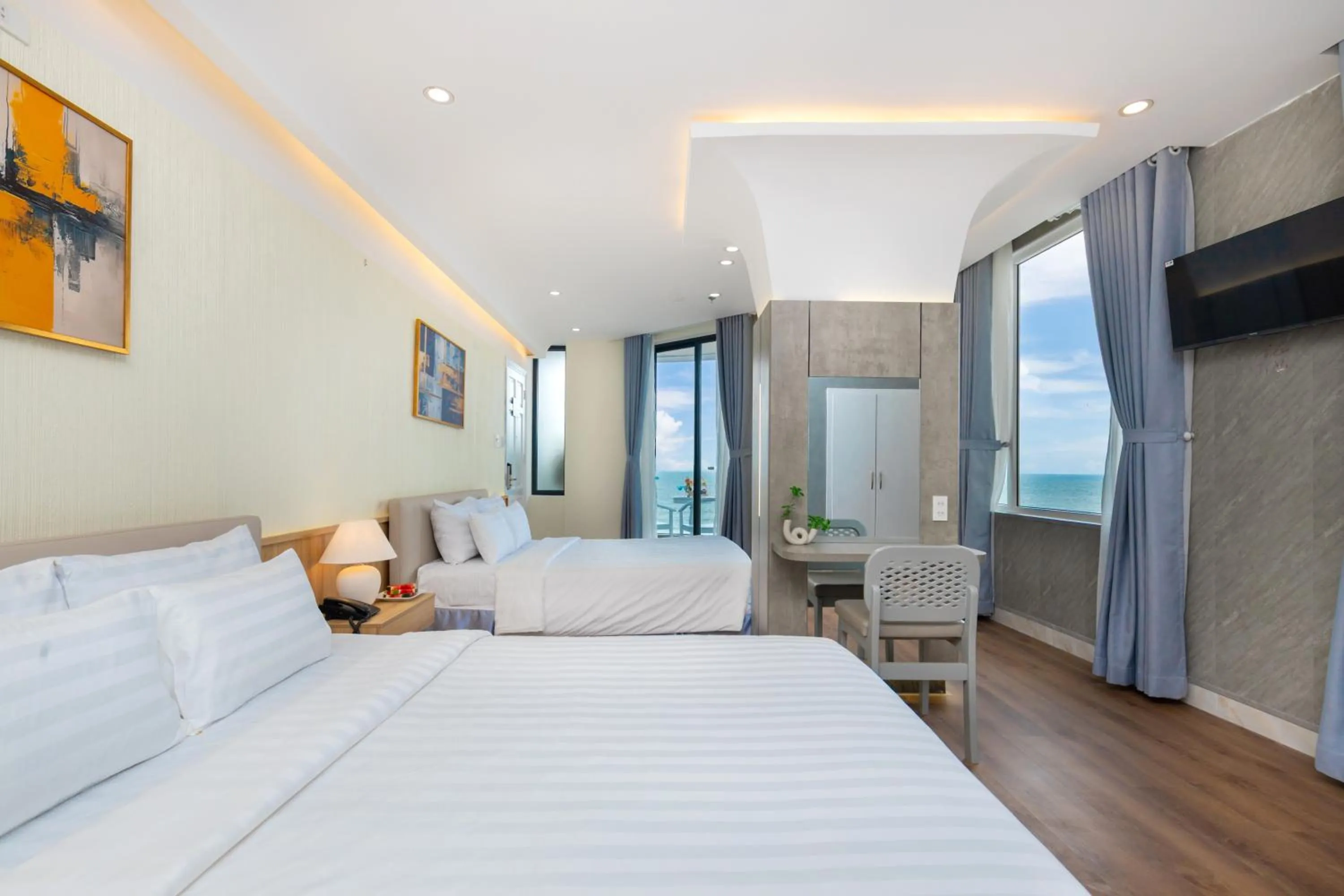 Photo of the whole room, Bed in ONE SEASON BOUTIQUE HOTEL Vung Tau - BEACHFRONT